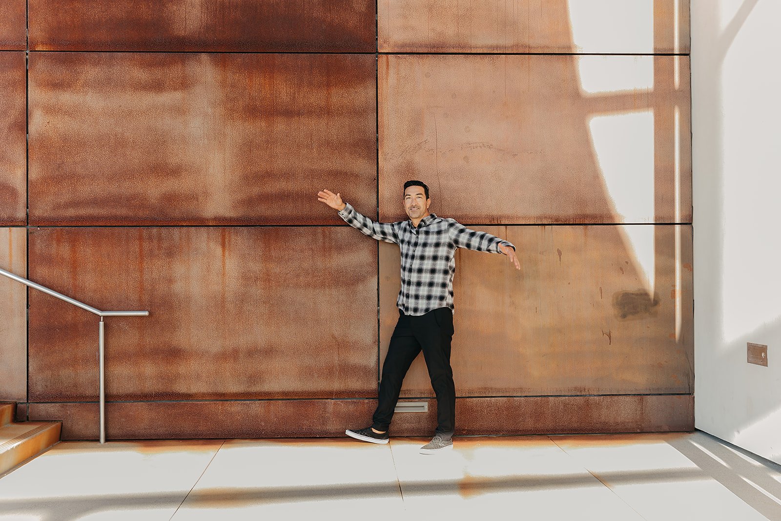 man walking by stairs