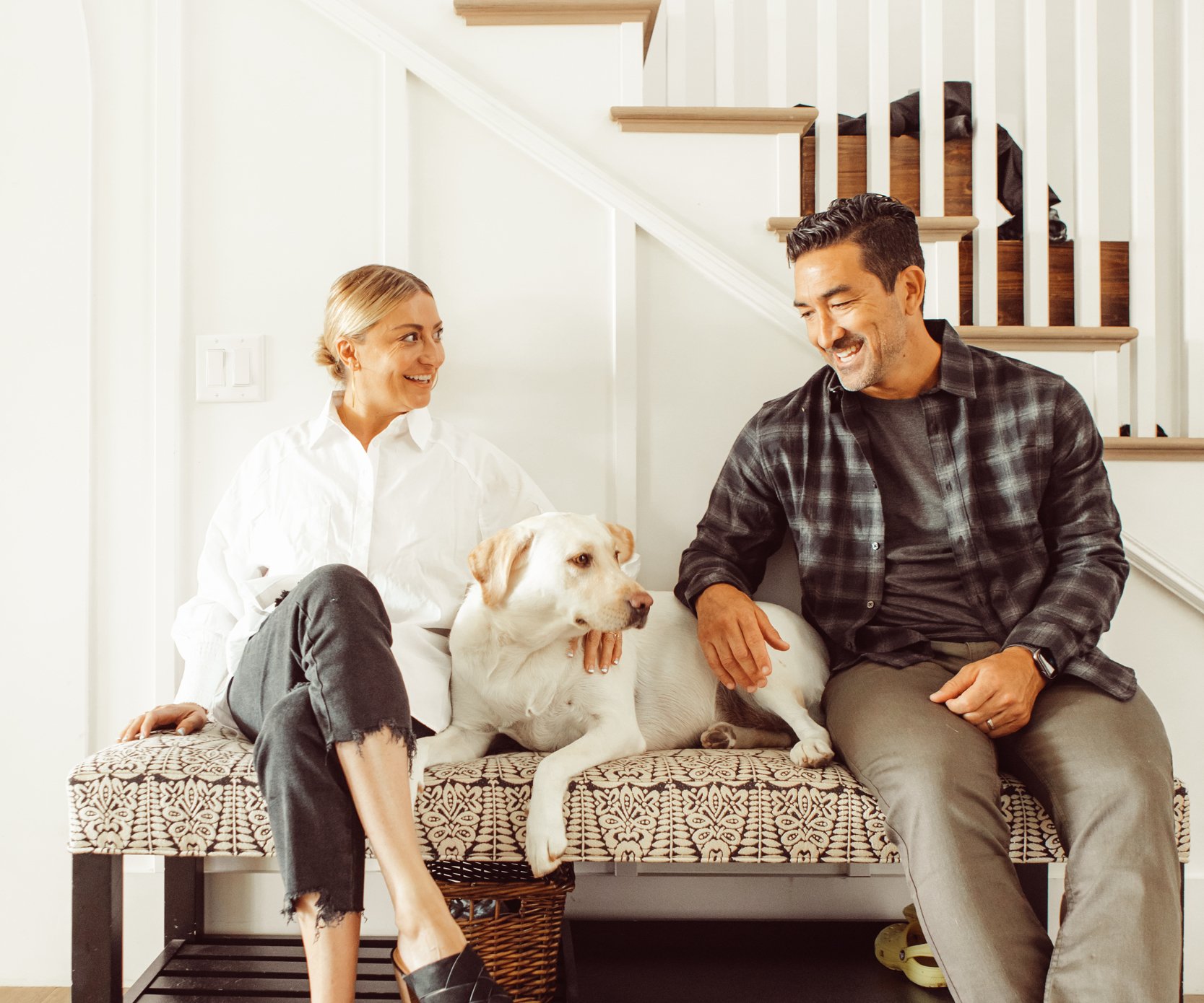 couple with their dog