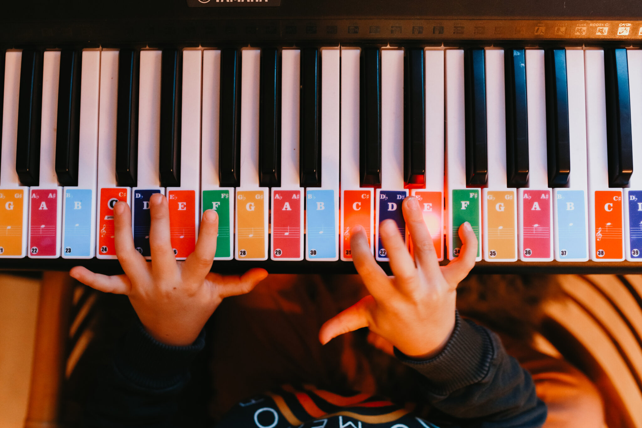 toddler playing the piano