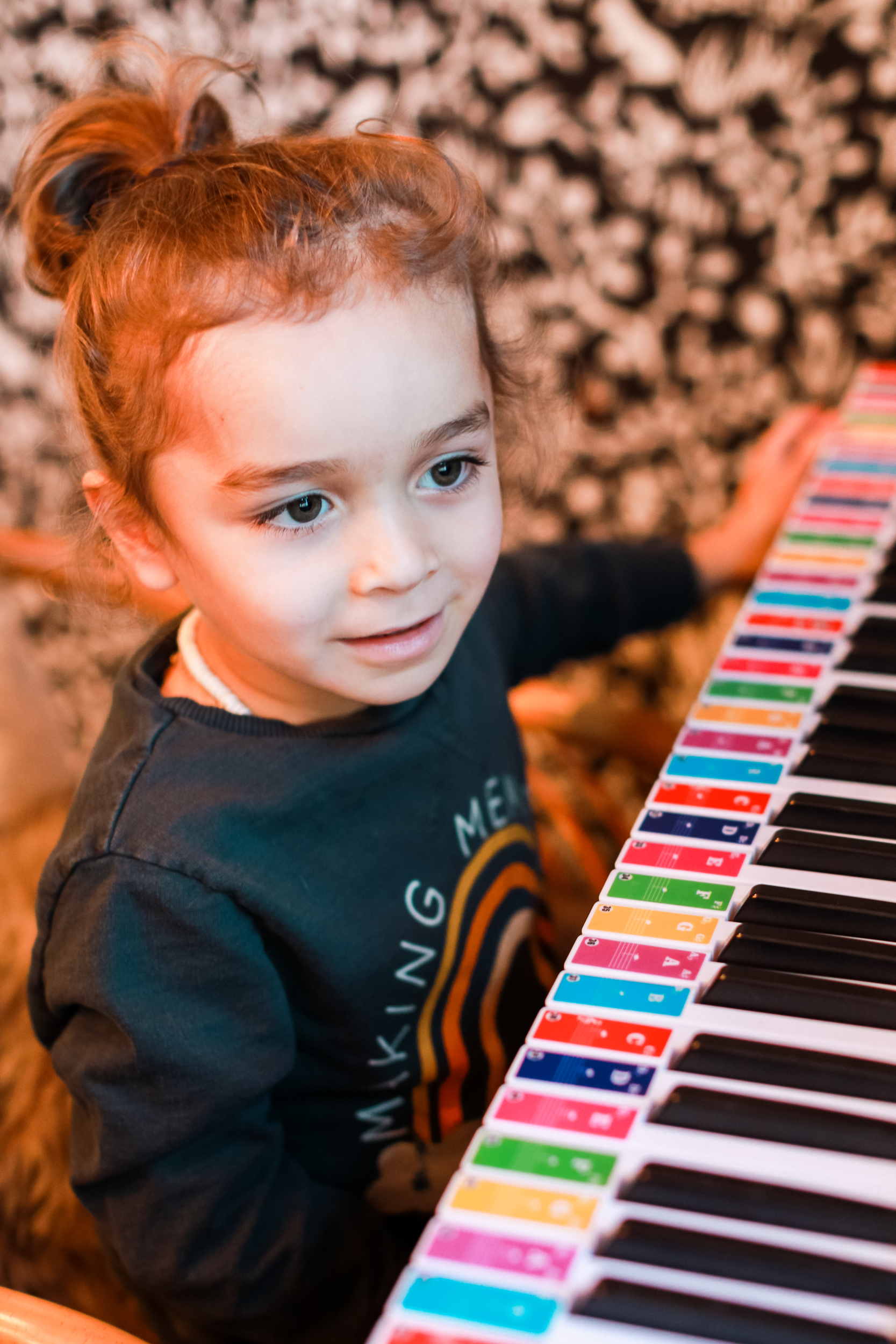 toddler playing piano