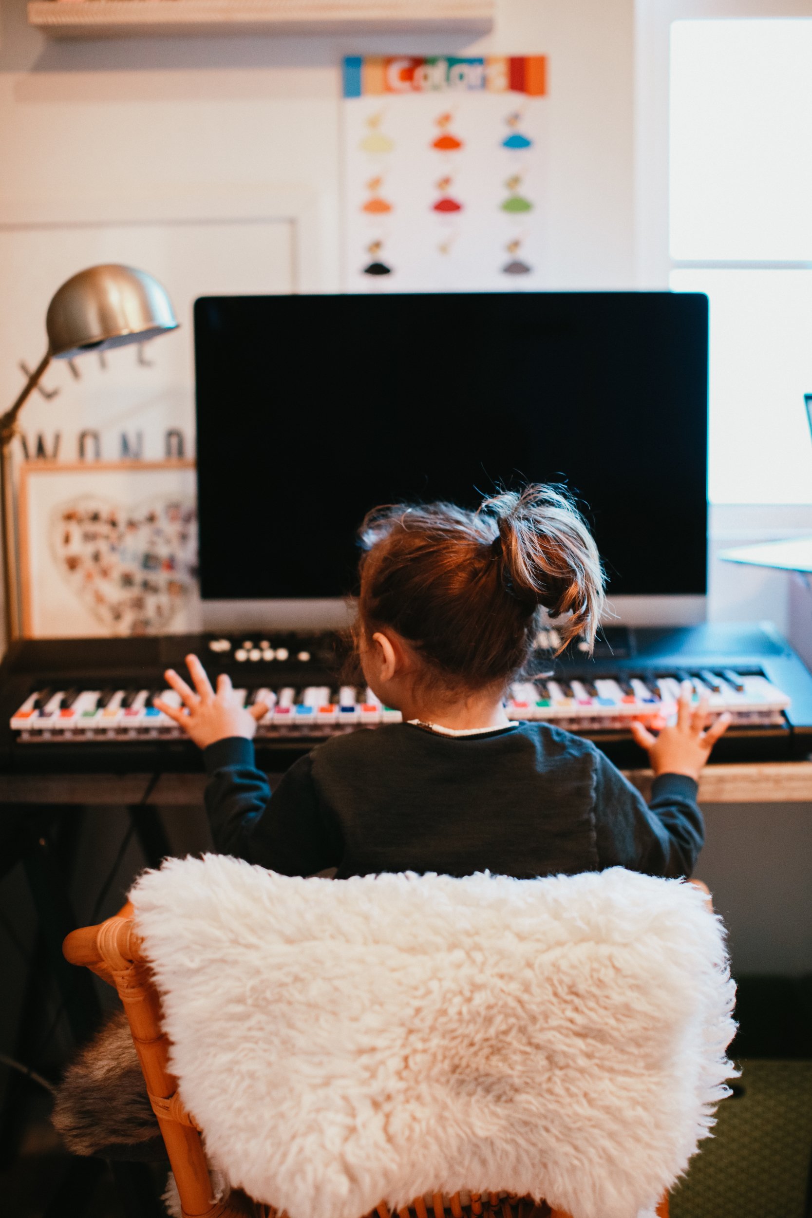 child playing piano