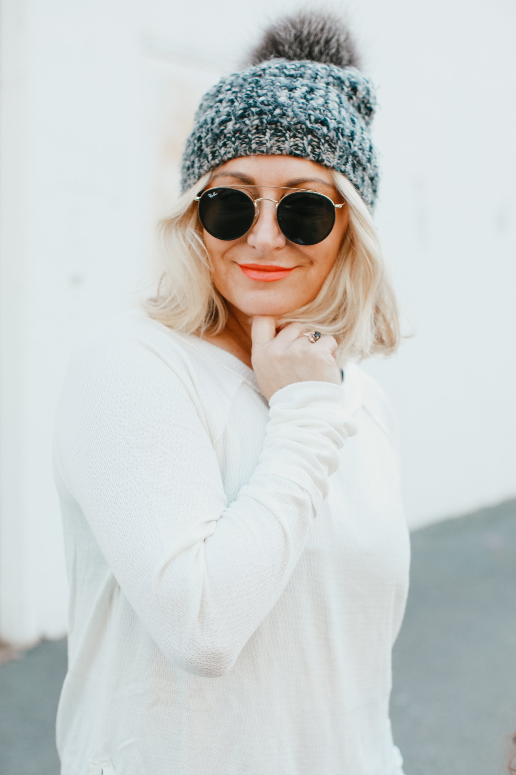woman in sweater and hat