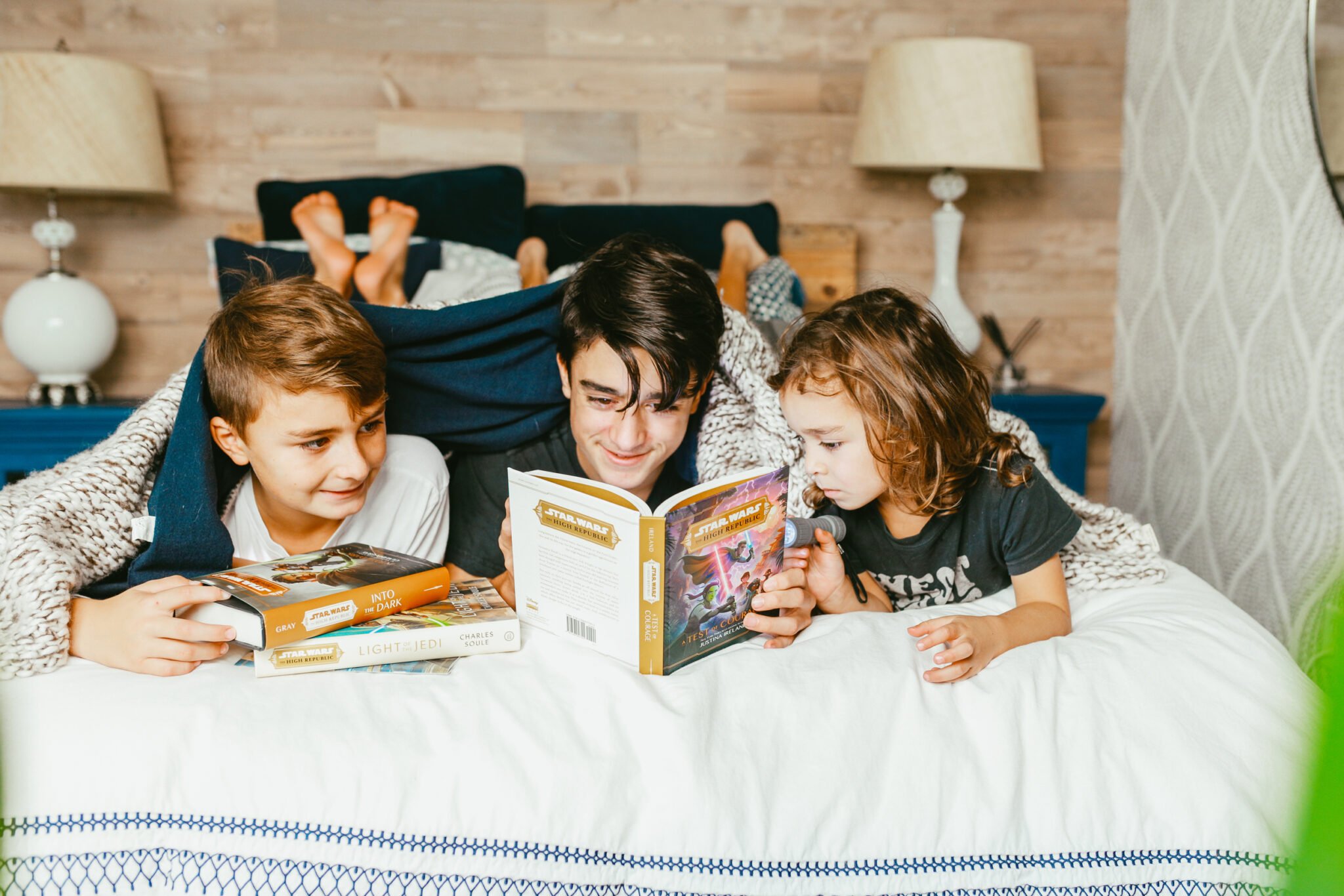 brothers reading a book