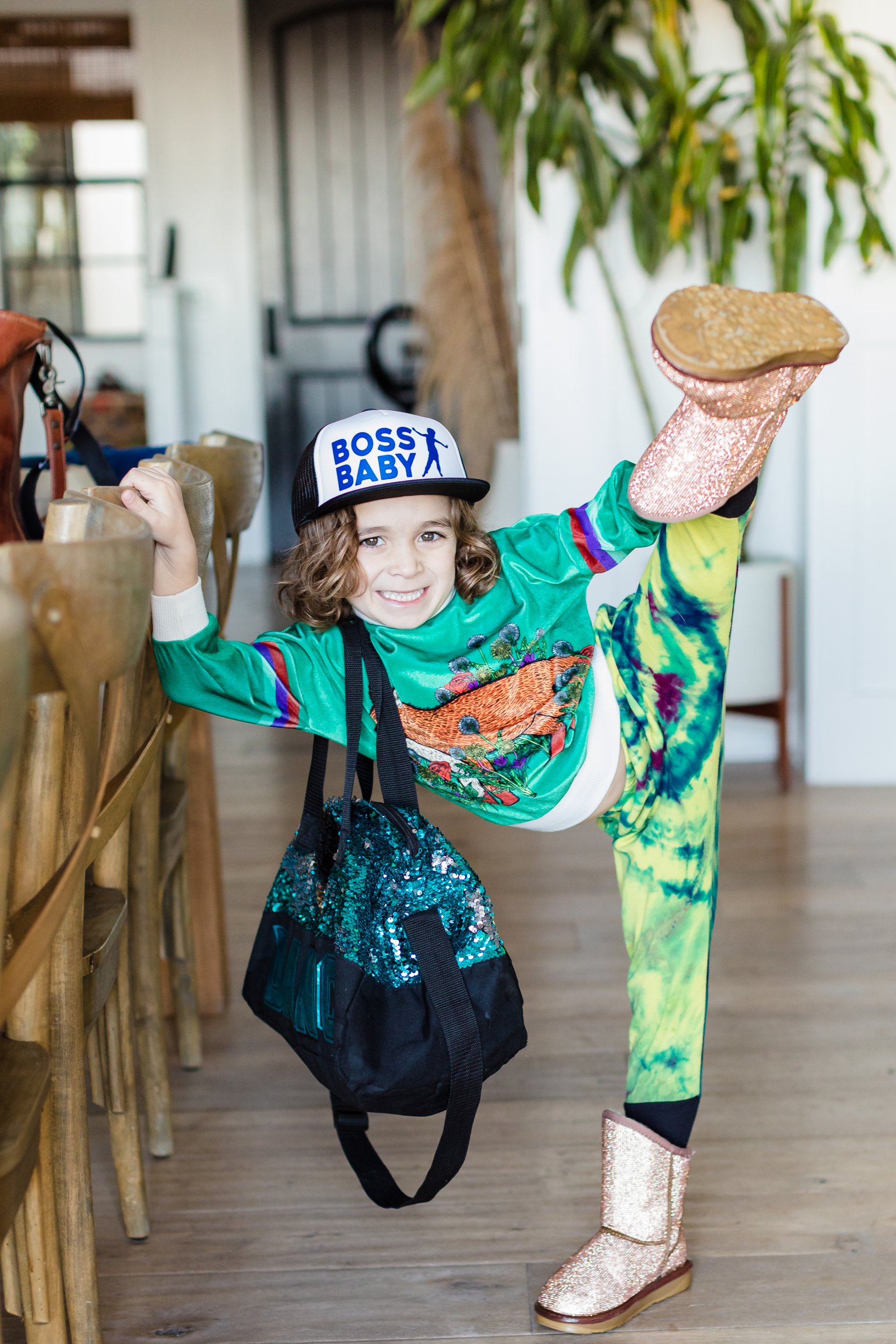 boy dancing in dining room