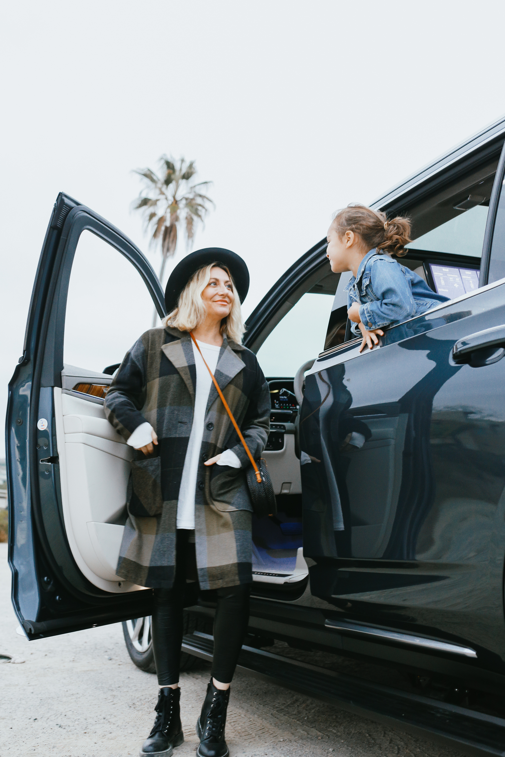 mom and kid in car