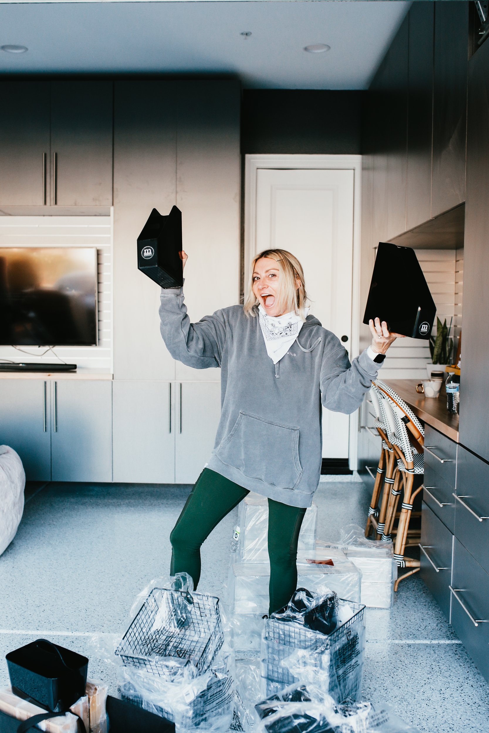 woman holding organization products