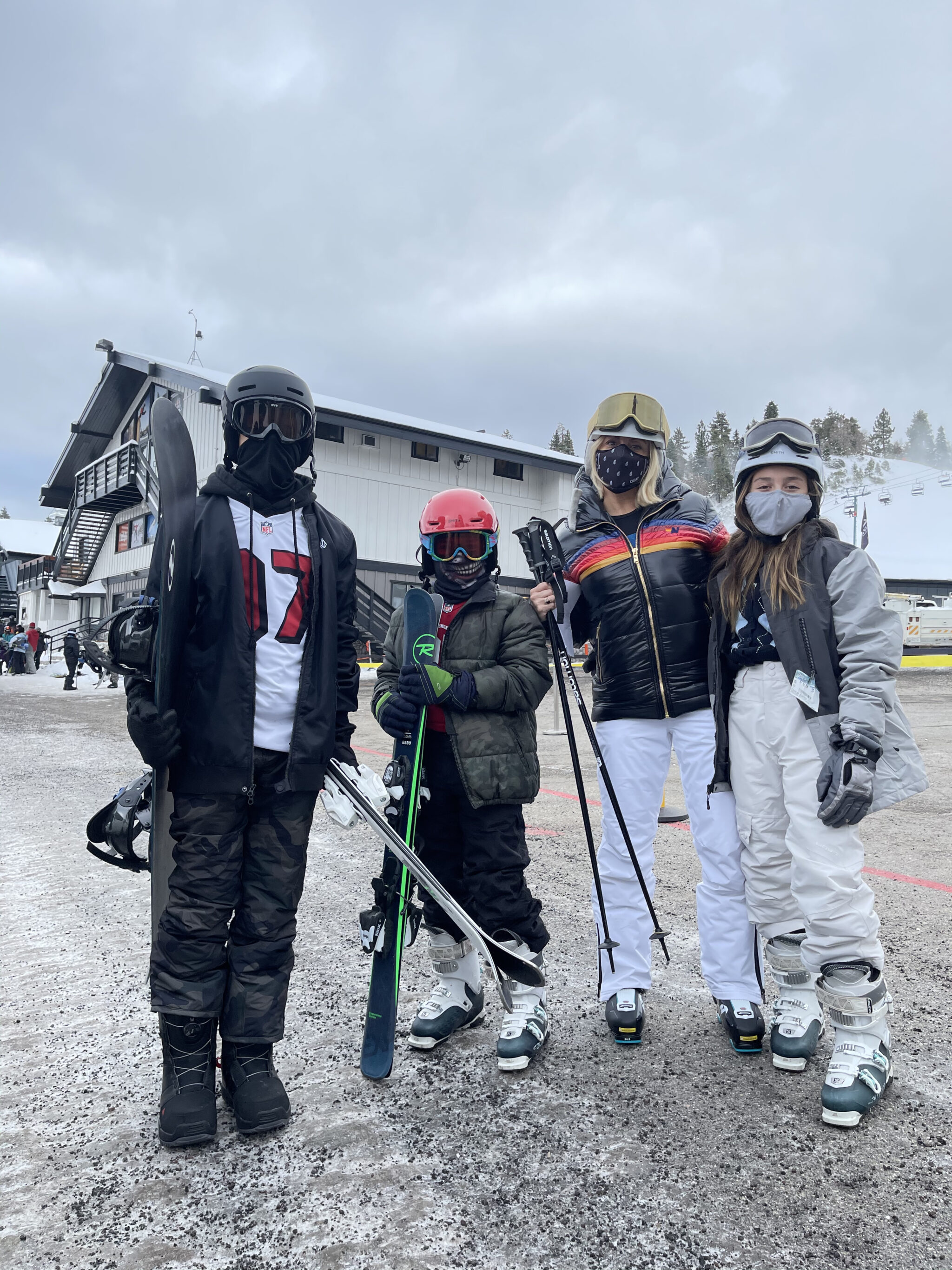 family skiing together