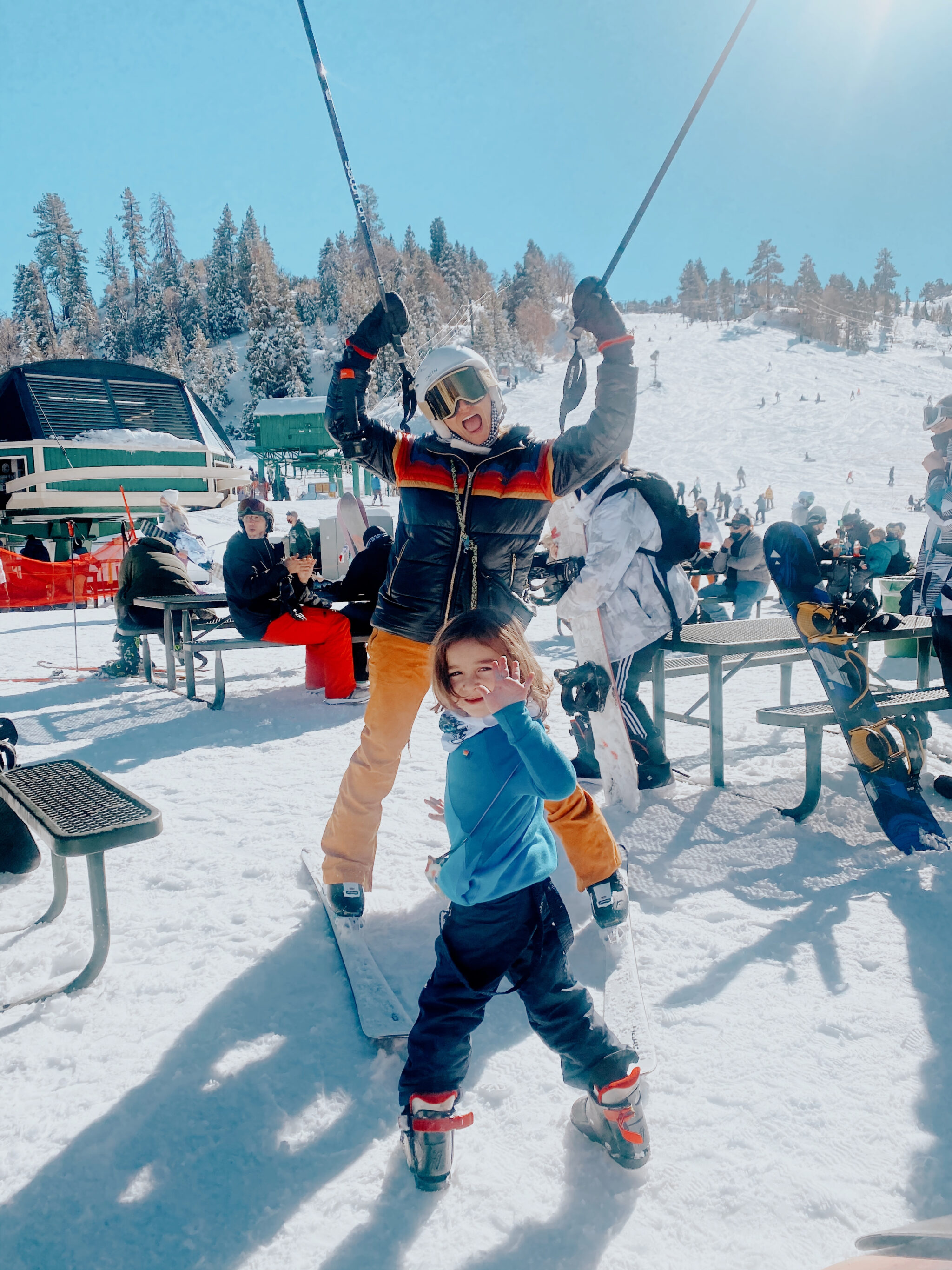 mom and son skiing