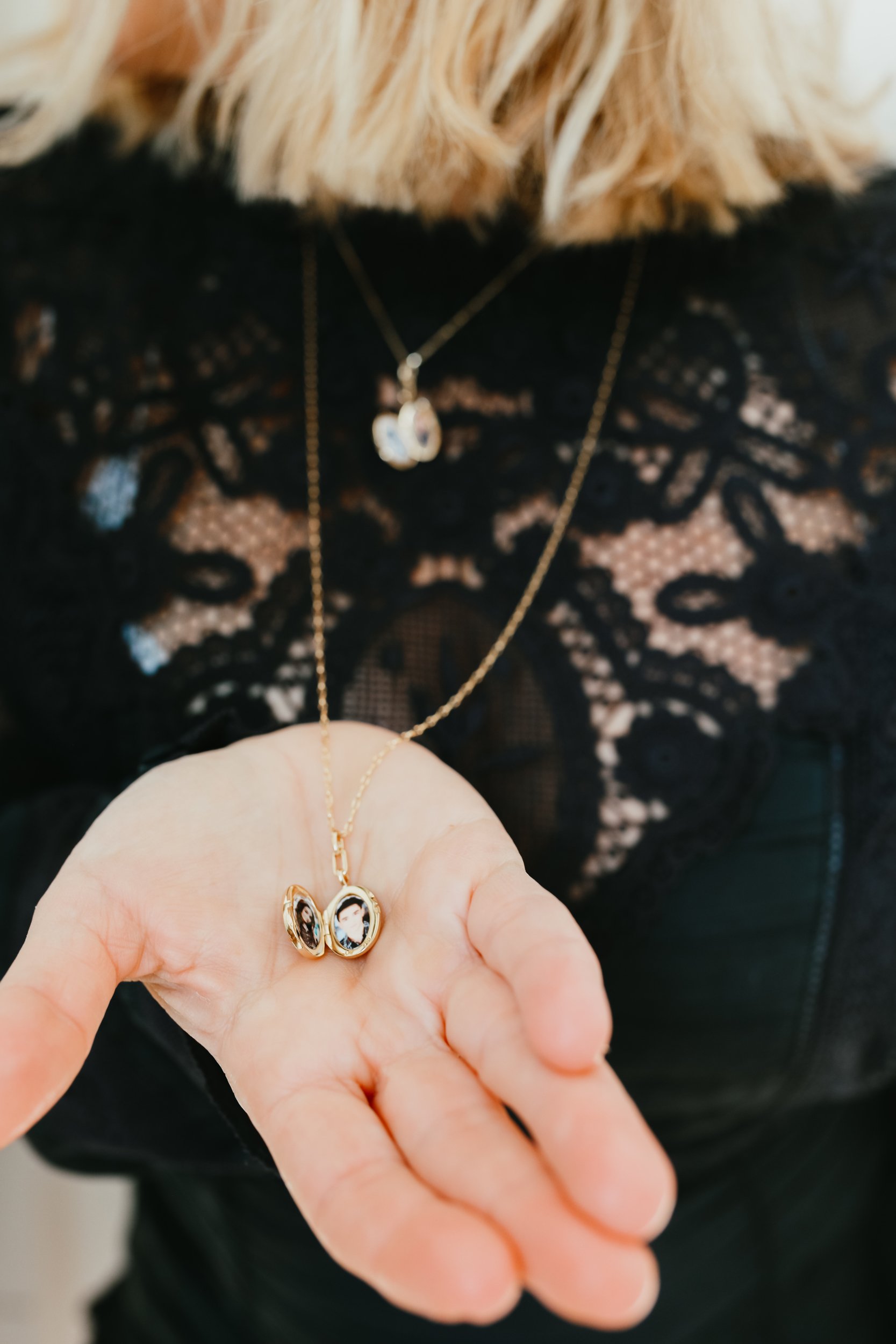 woman holding mother's day locket