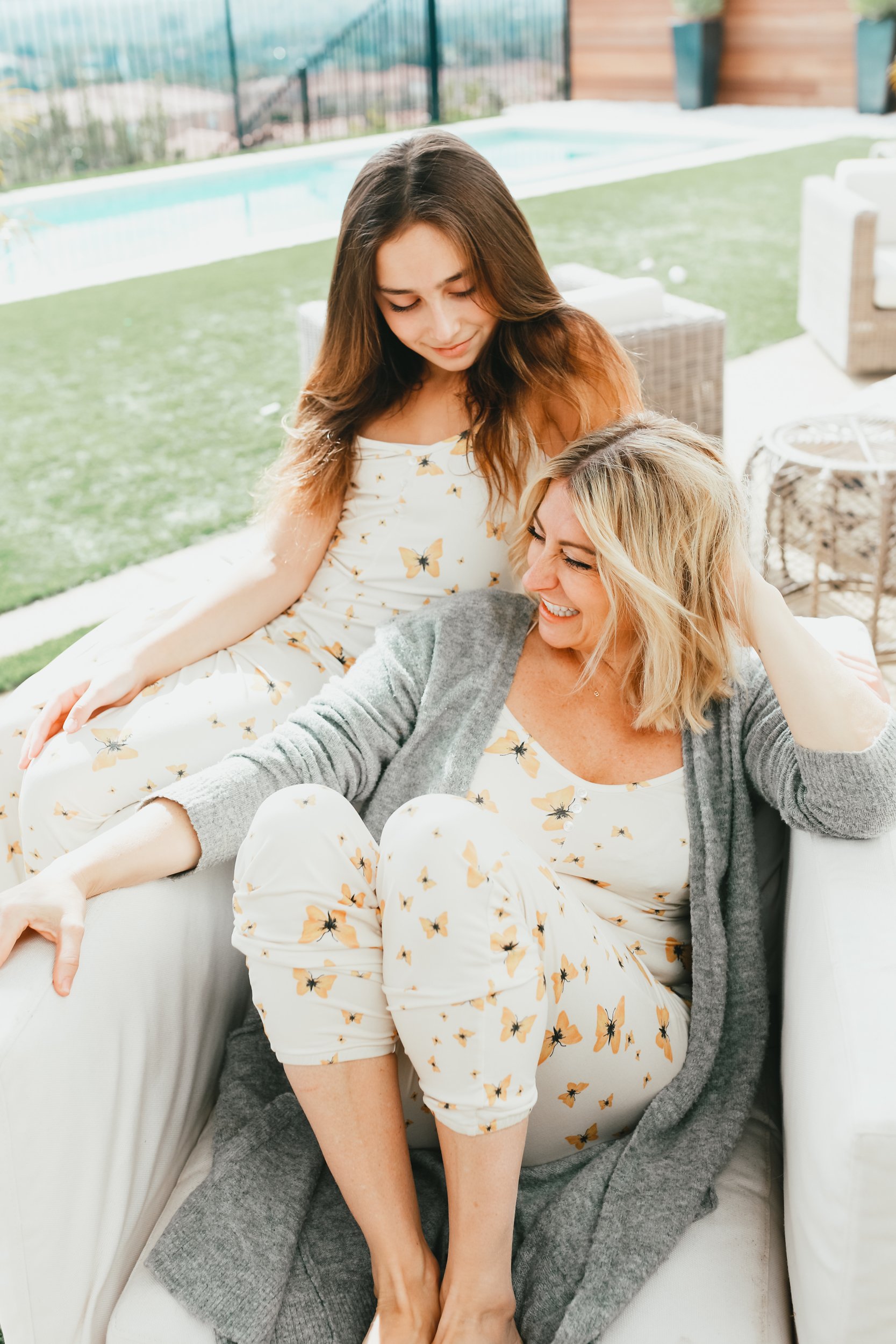 mom and daughter sitting together