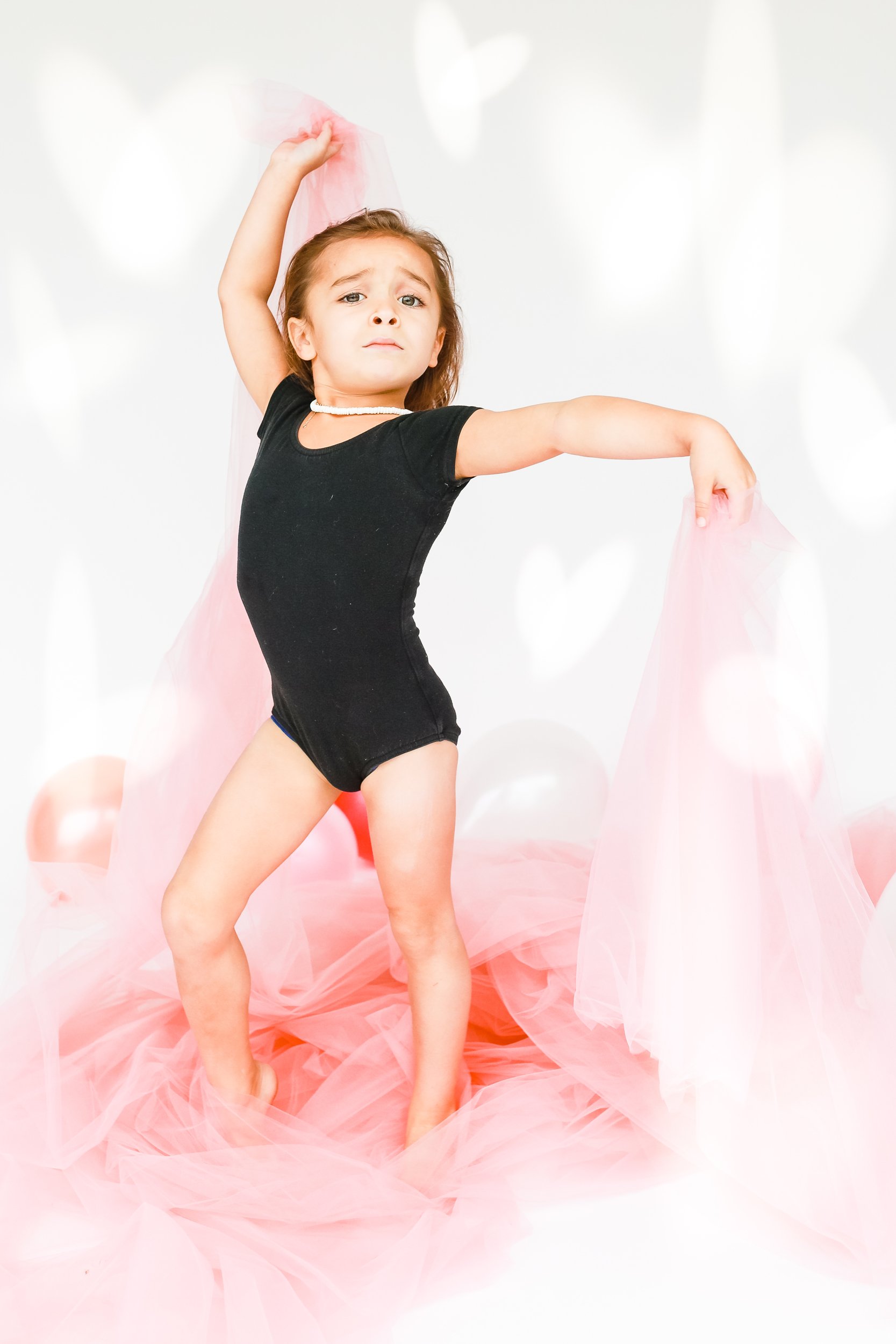 dancing toddler with pink tulle