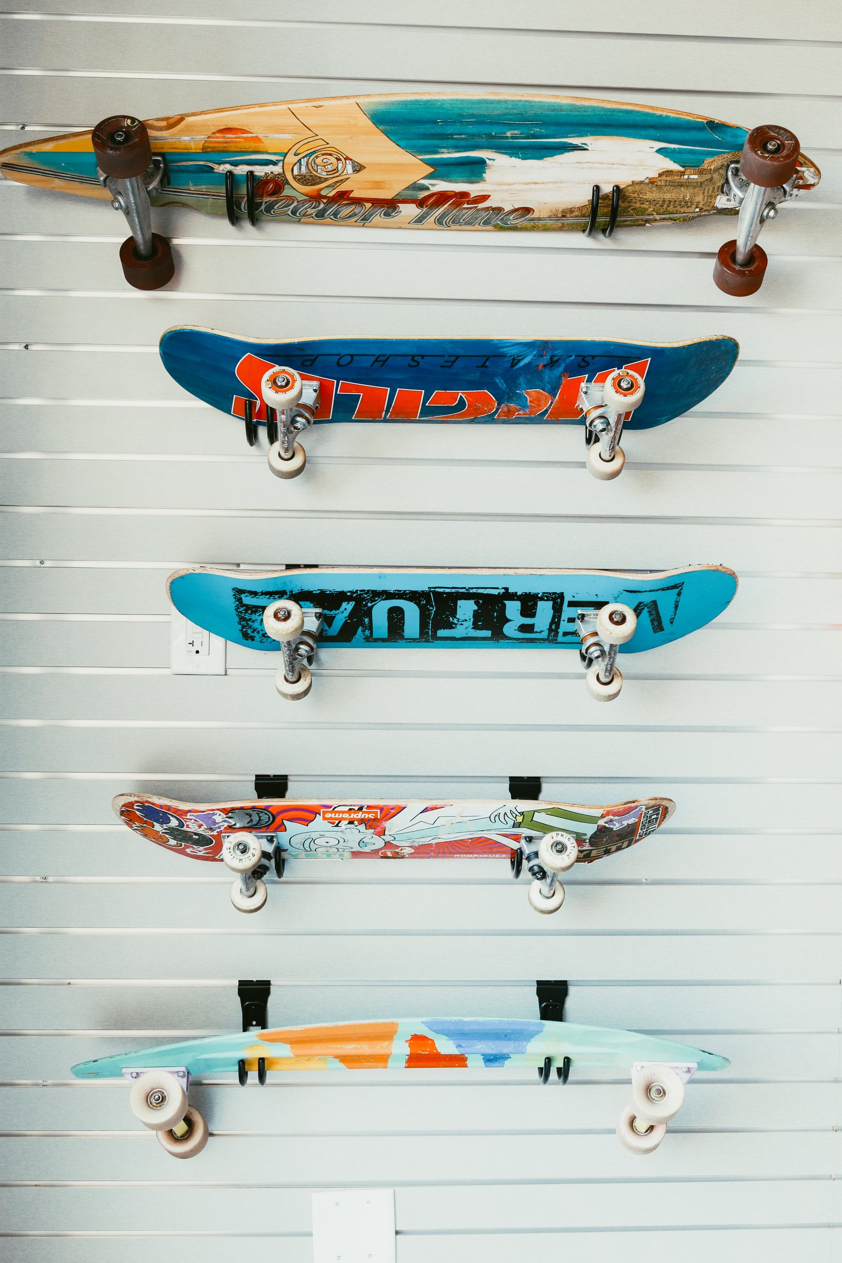 skateboards hanging on the wall