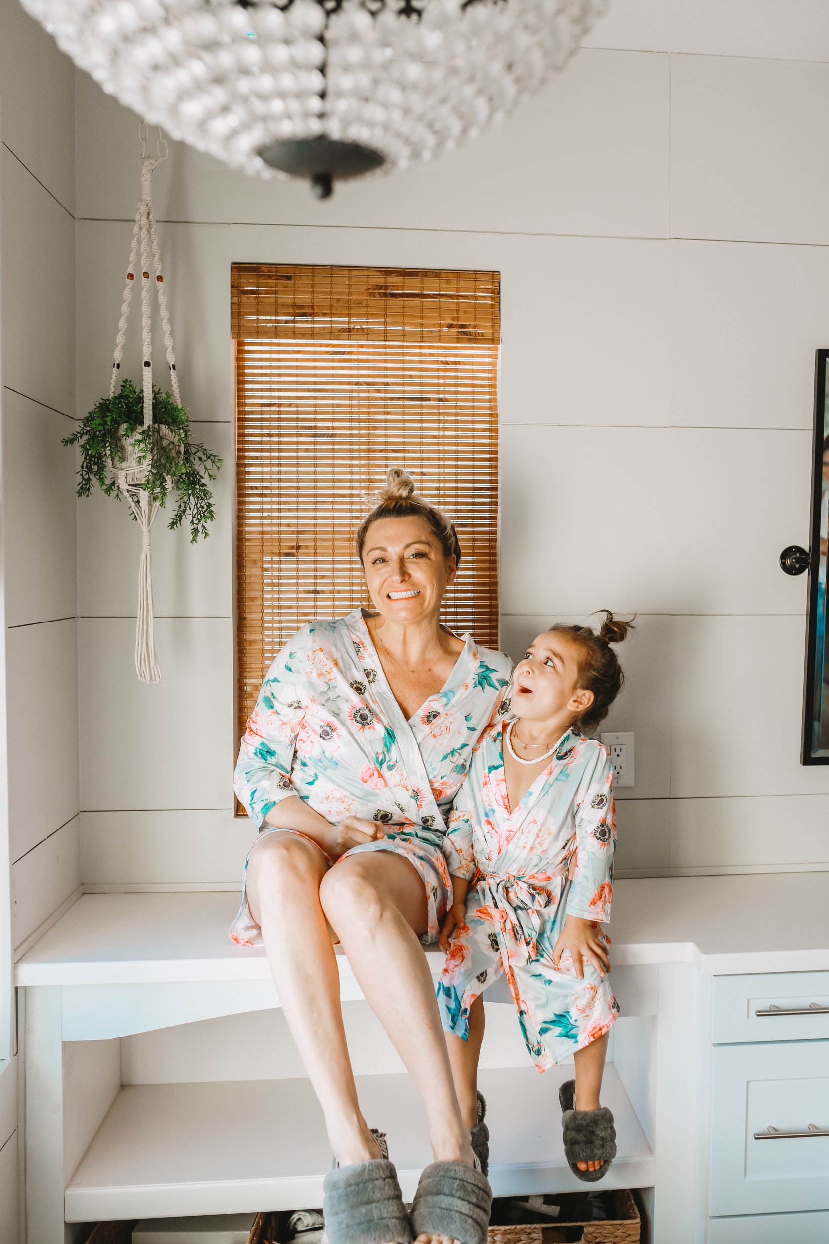 mom and son in matching bath robes