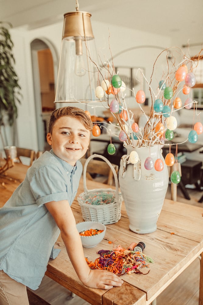 decorating an easter egg tree