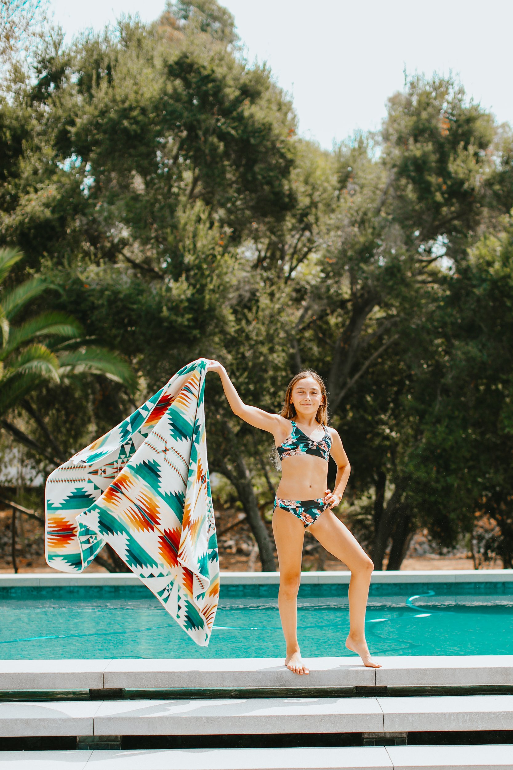 girl with her towel at pool
