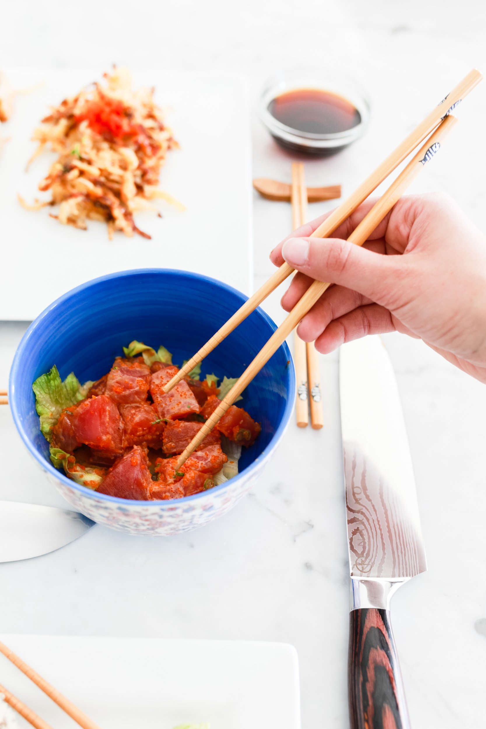 eating sushi with chopsticks