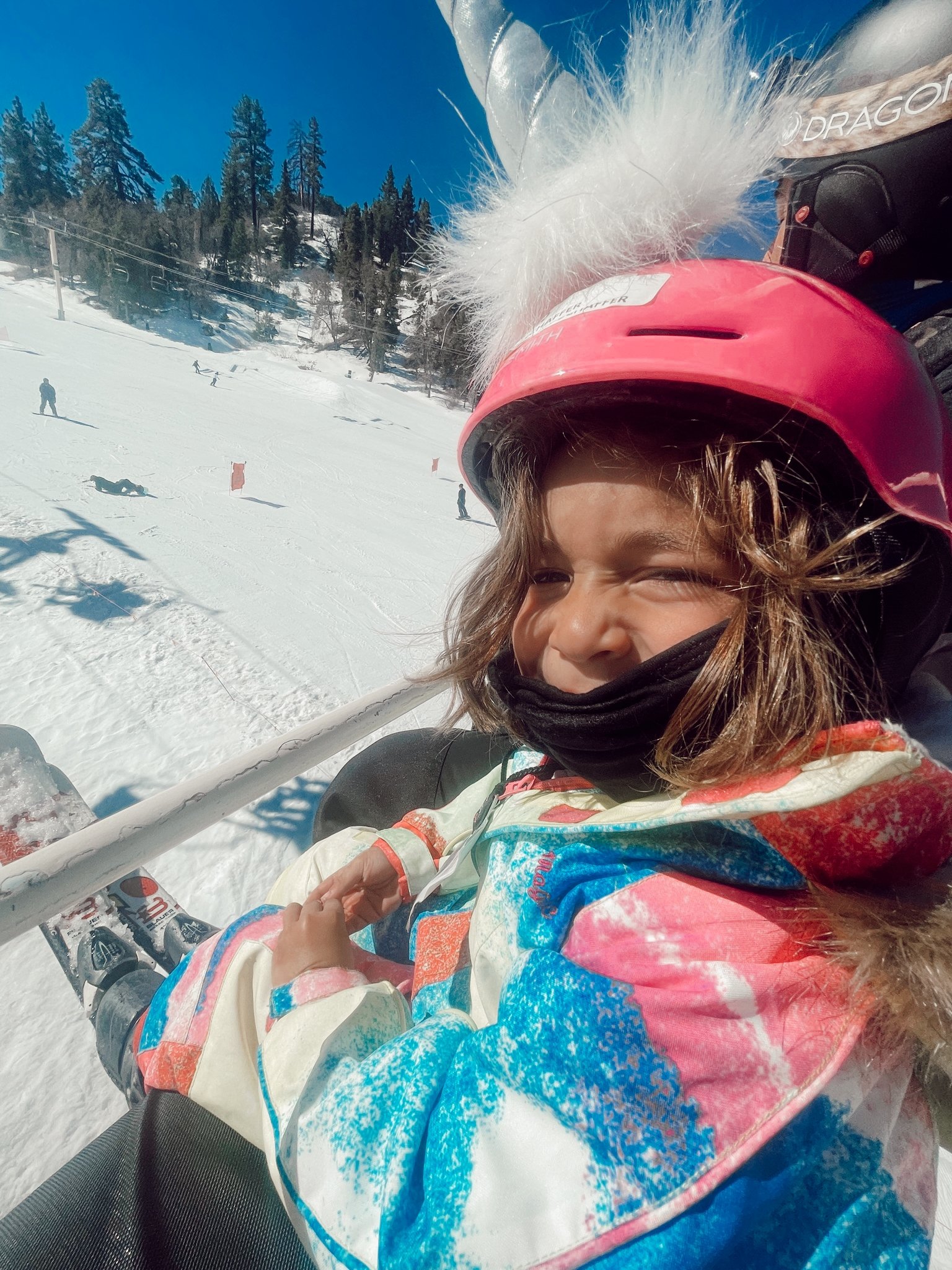 child on ski lift