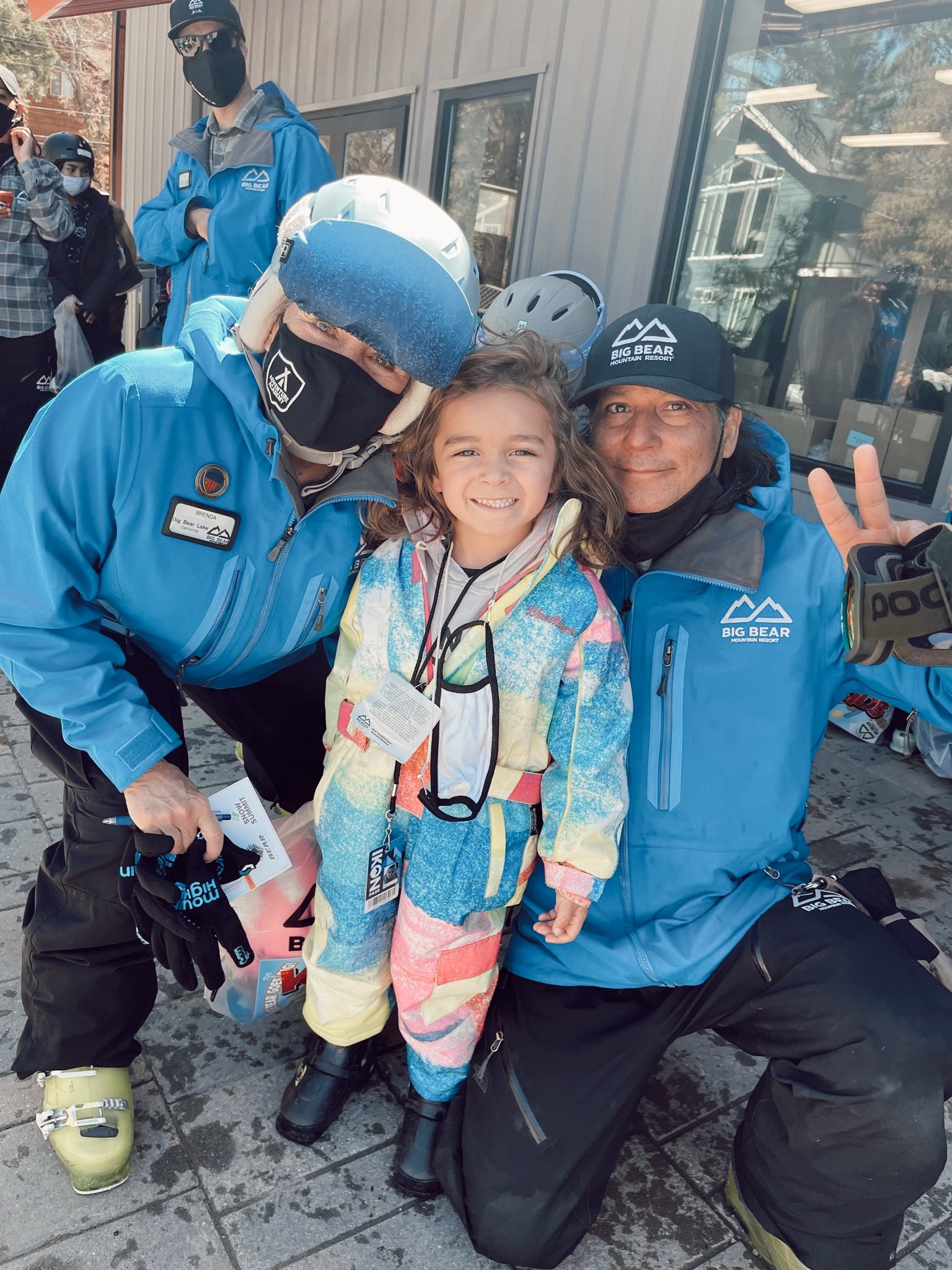 kid with ski instructor