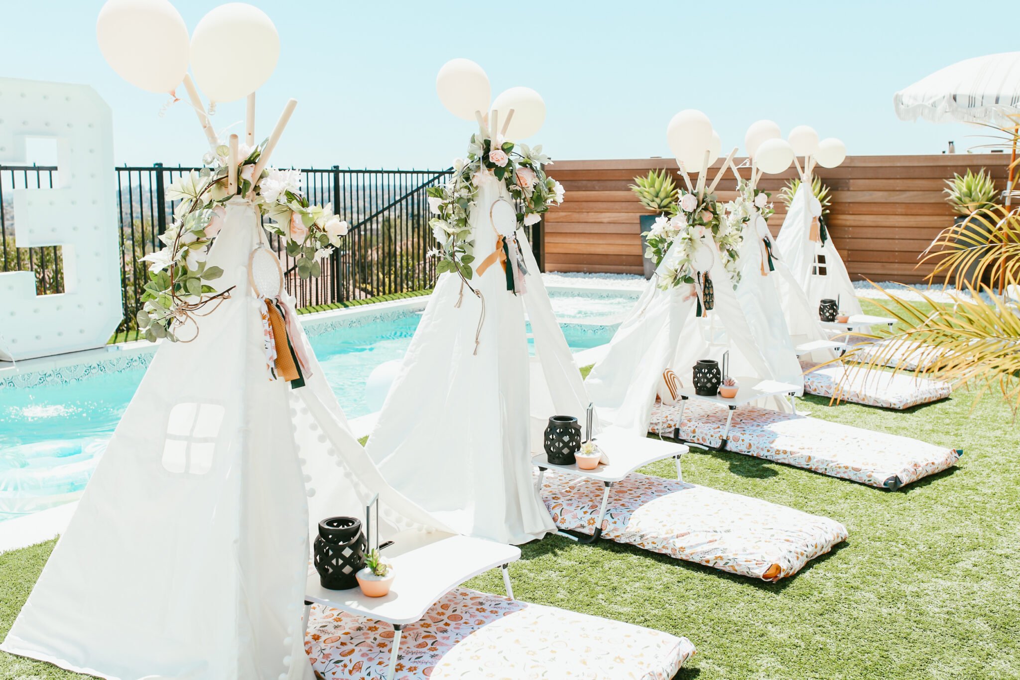 tepees by pool