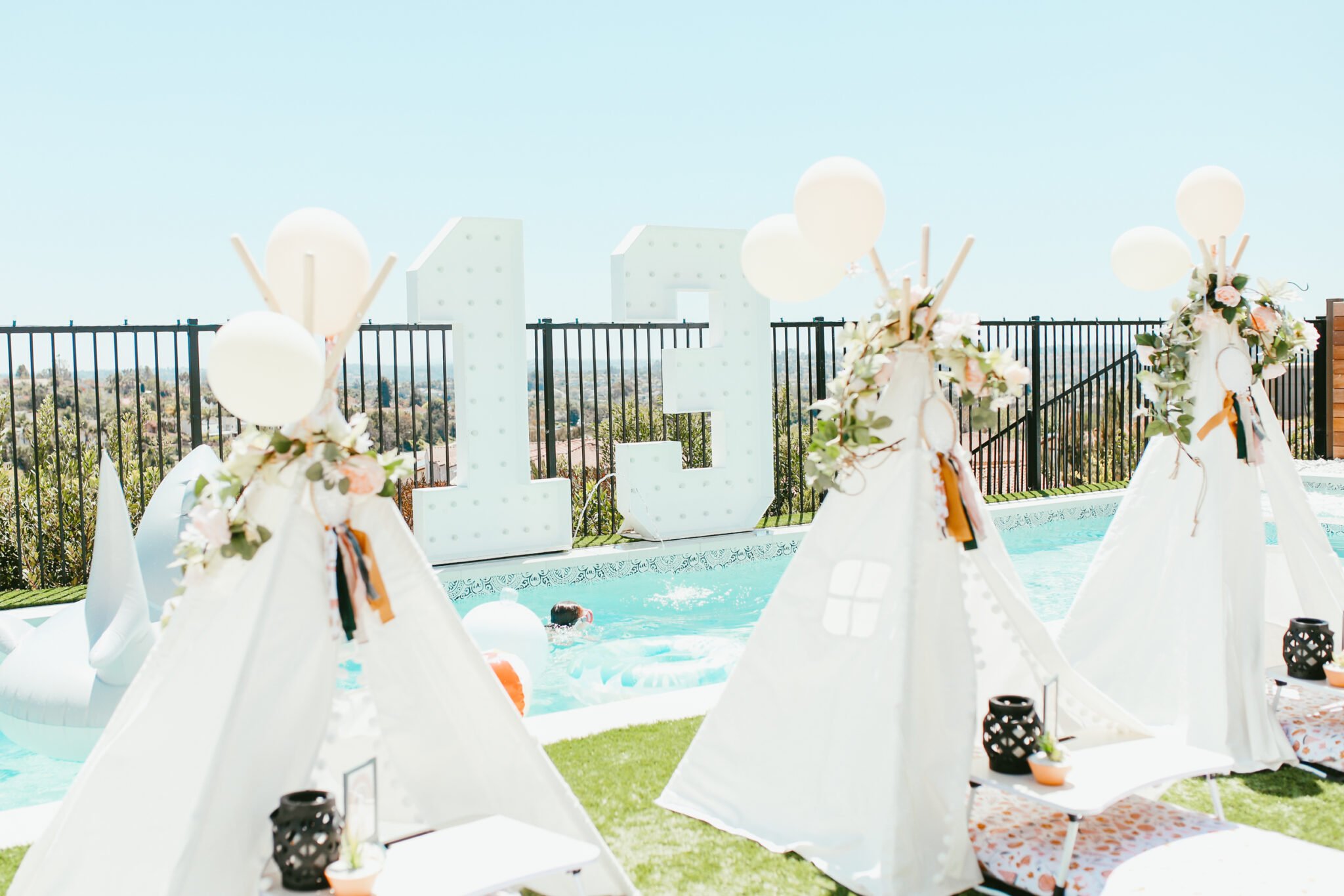 tepees by pool