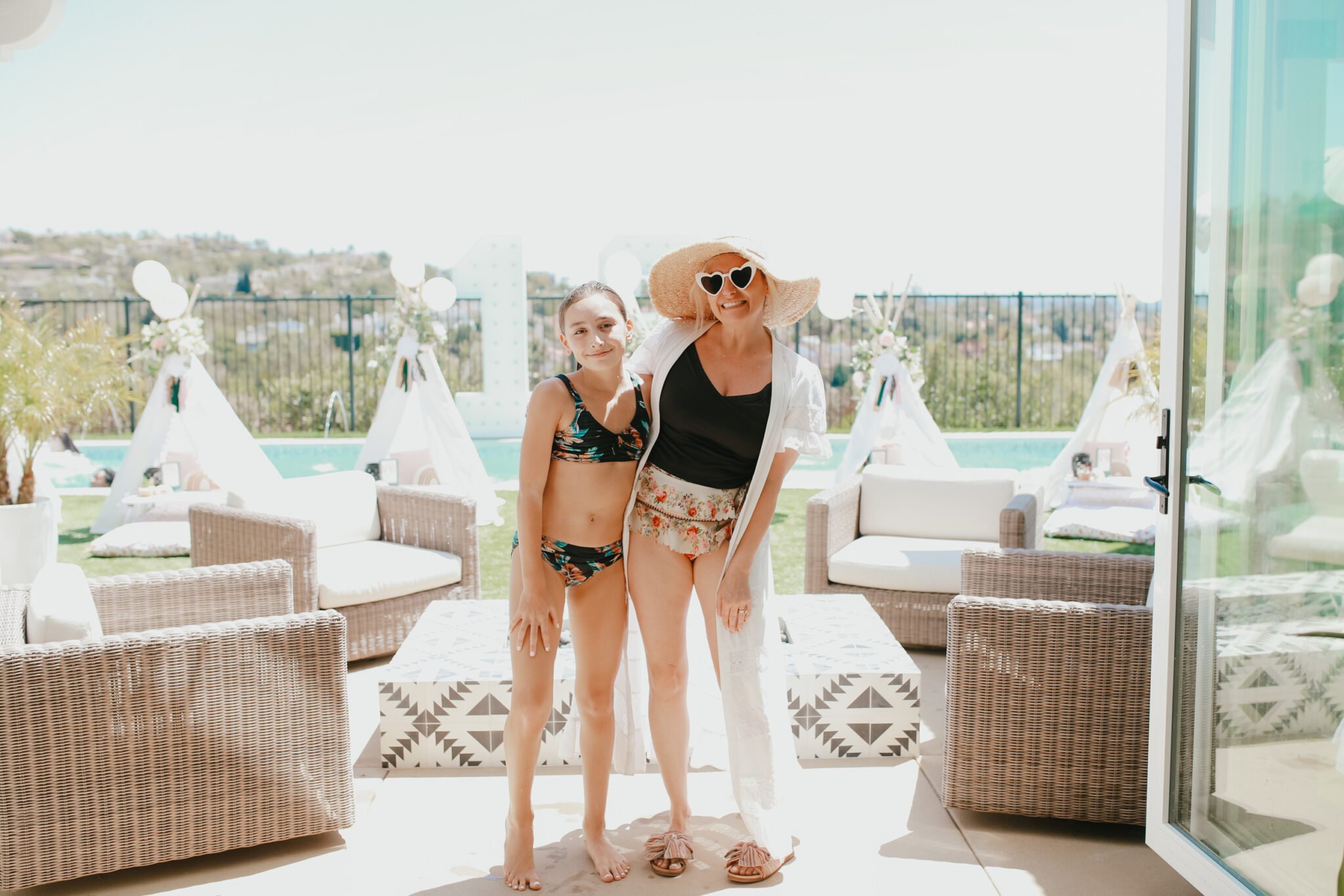 mom and daughter in swimwear