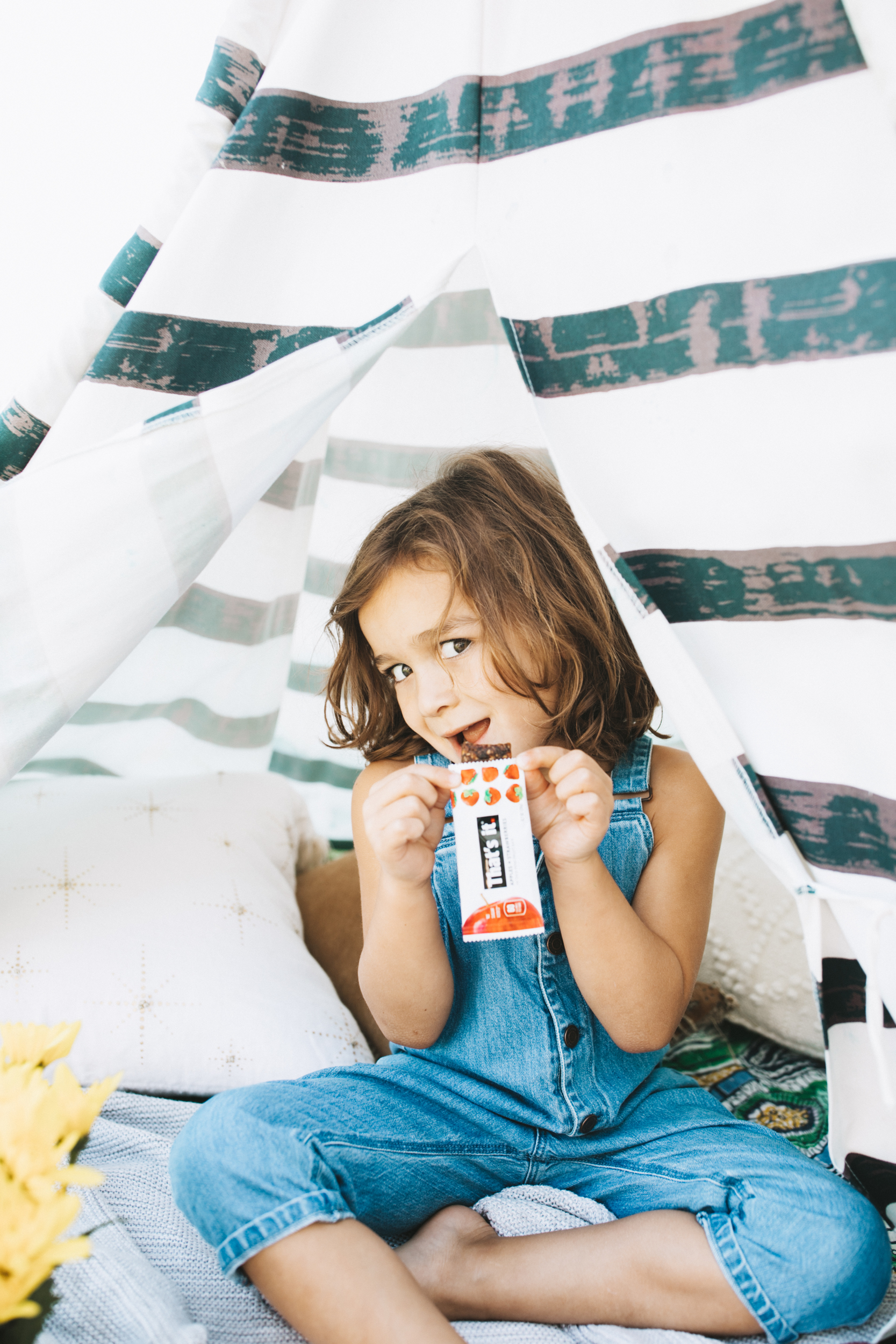 kid eating fruit bar