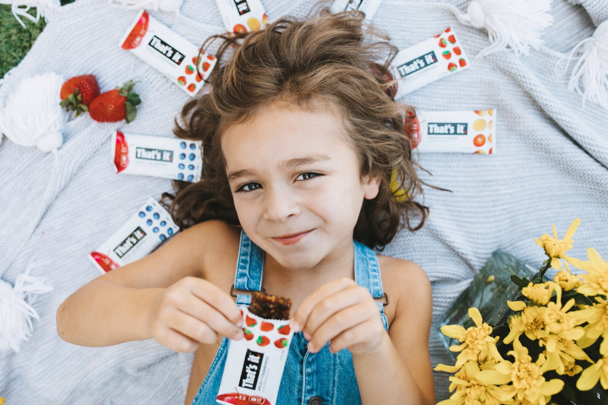 boy eating fruit snacks