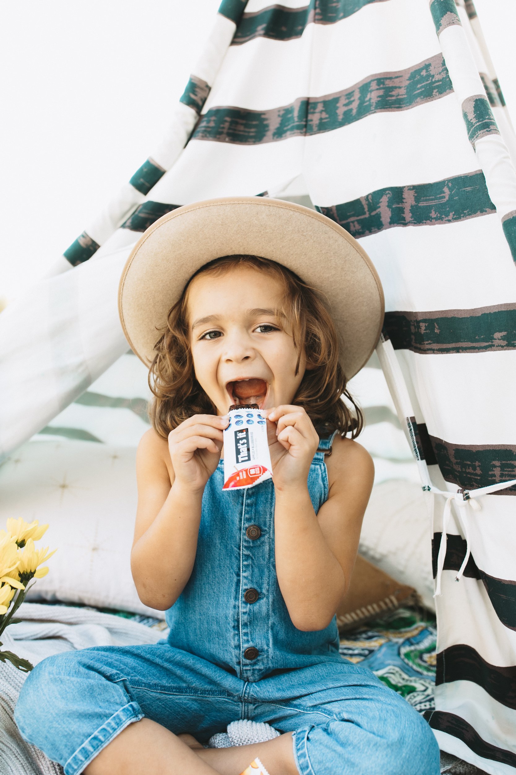 boy eating fruit bar