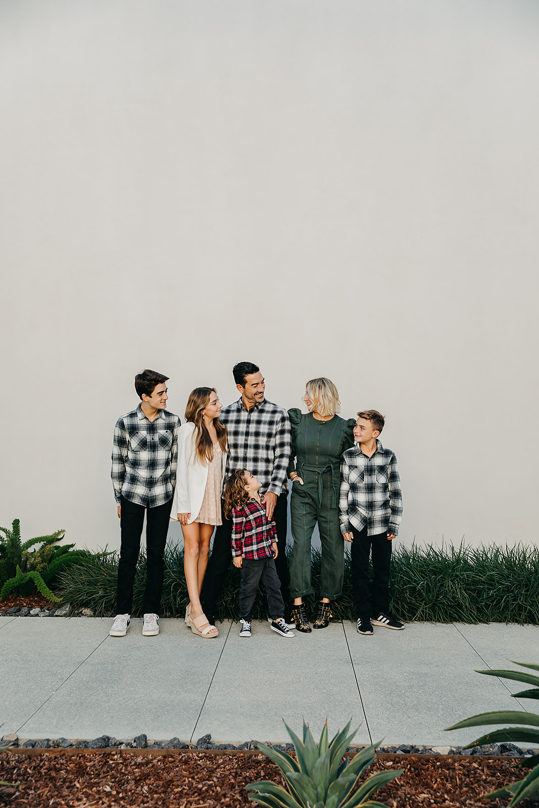 family standing together outside