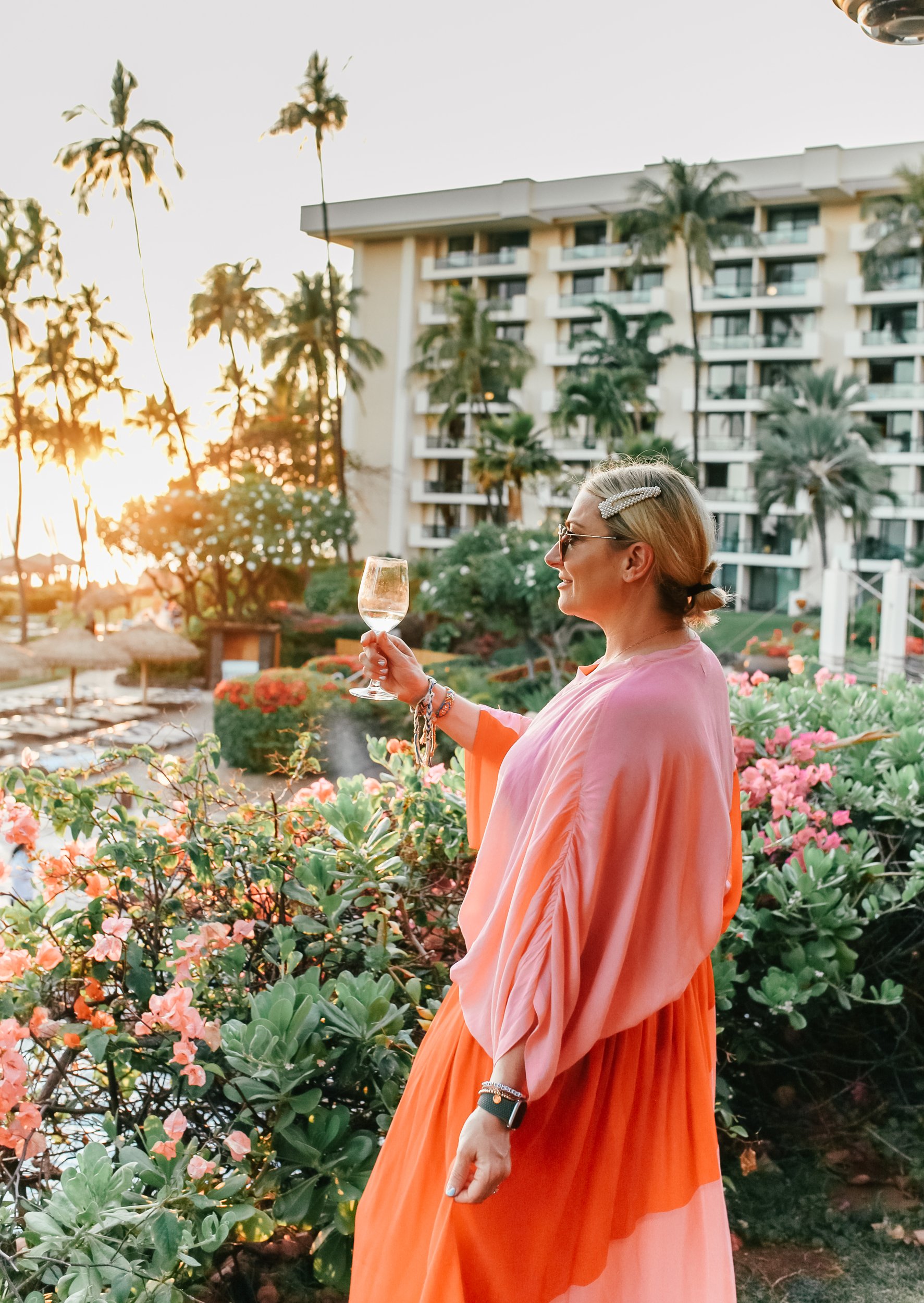 woman toasting in hawaii