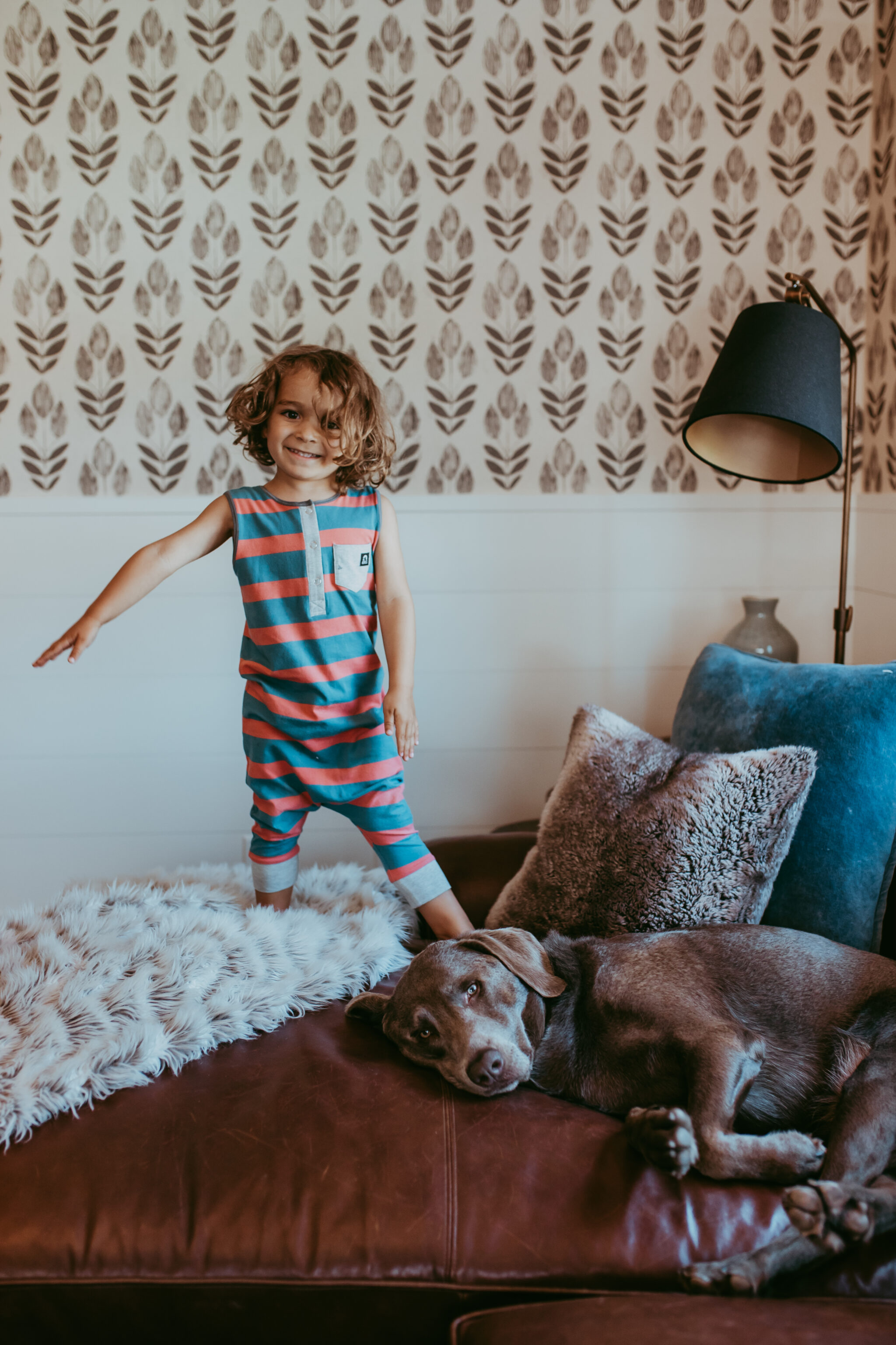 boy and dog on couch