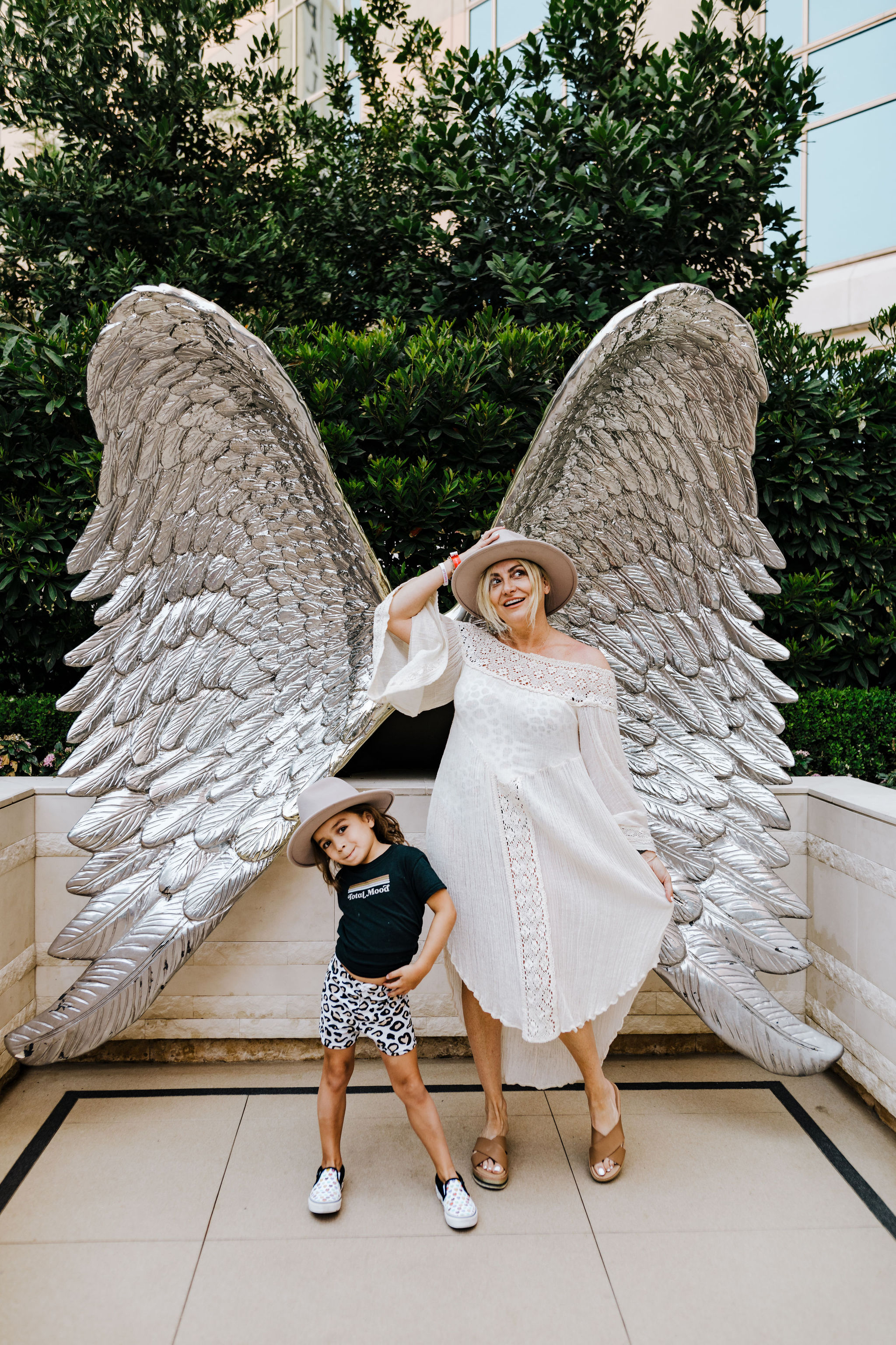 mom and son with angel wings
