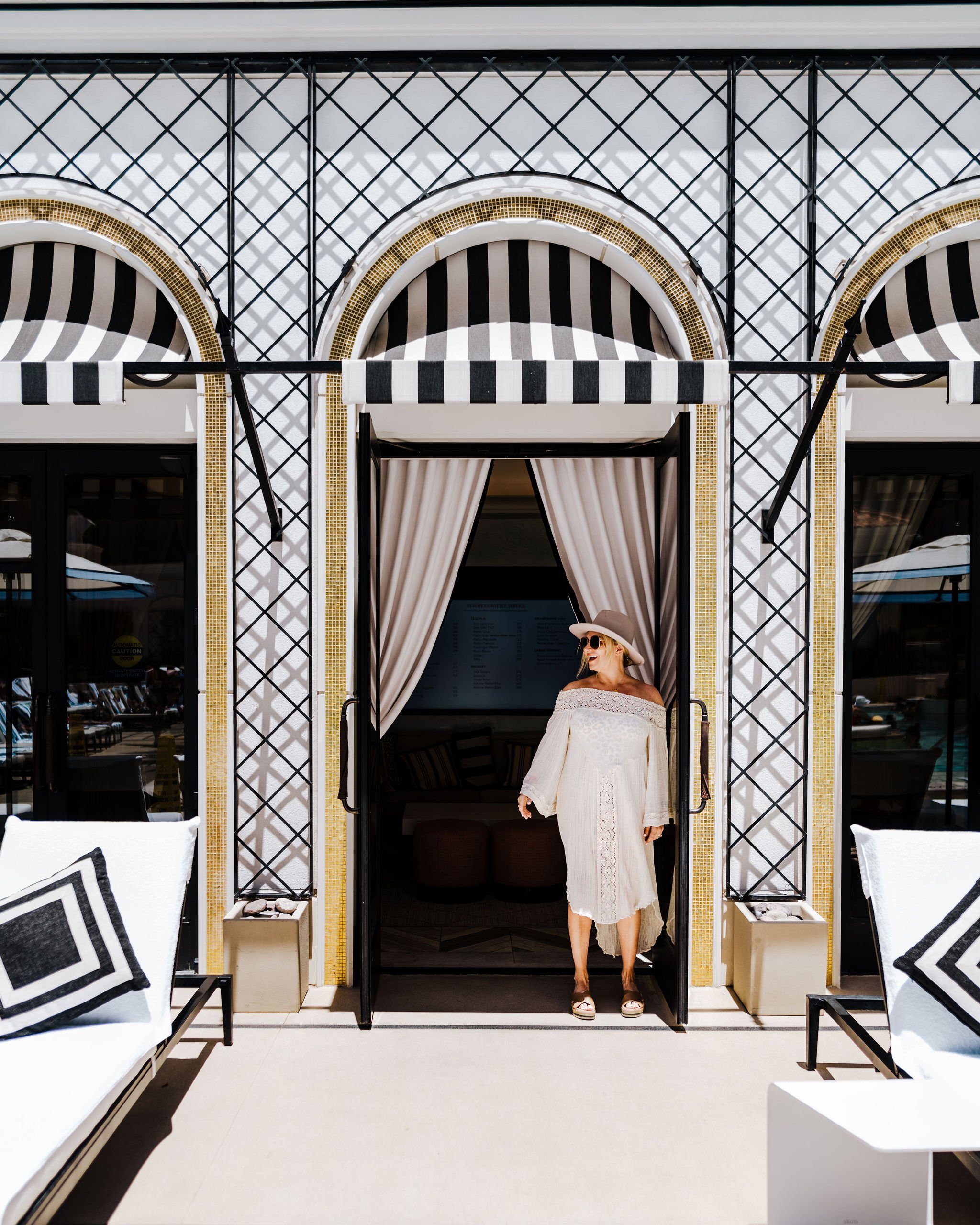 woman at pool cabana