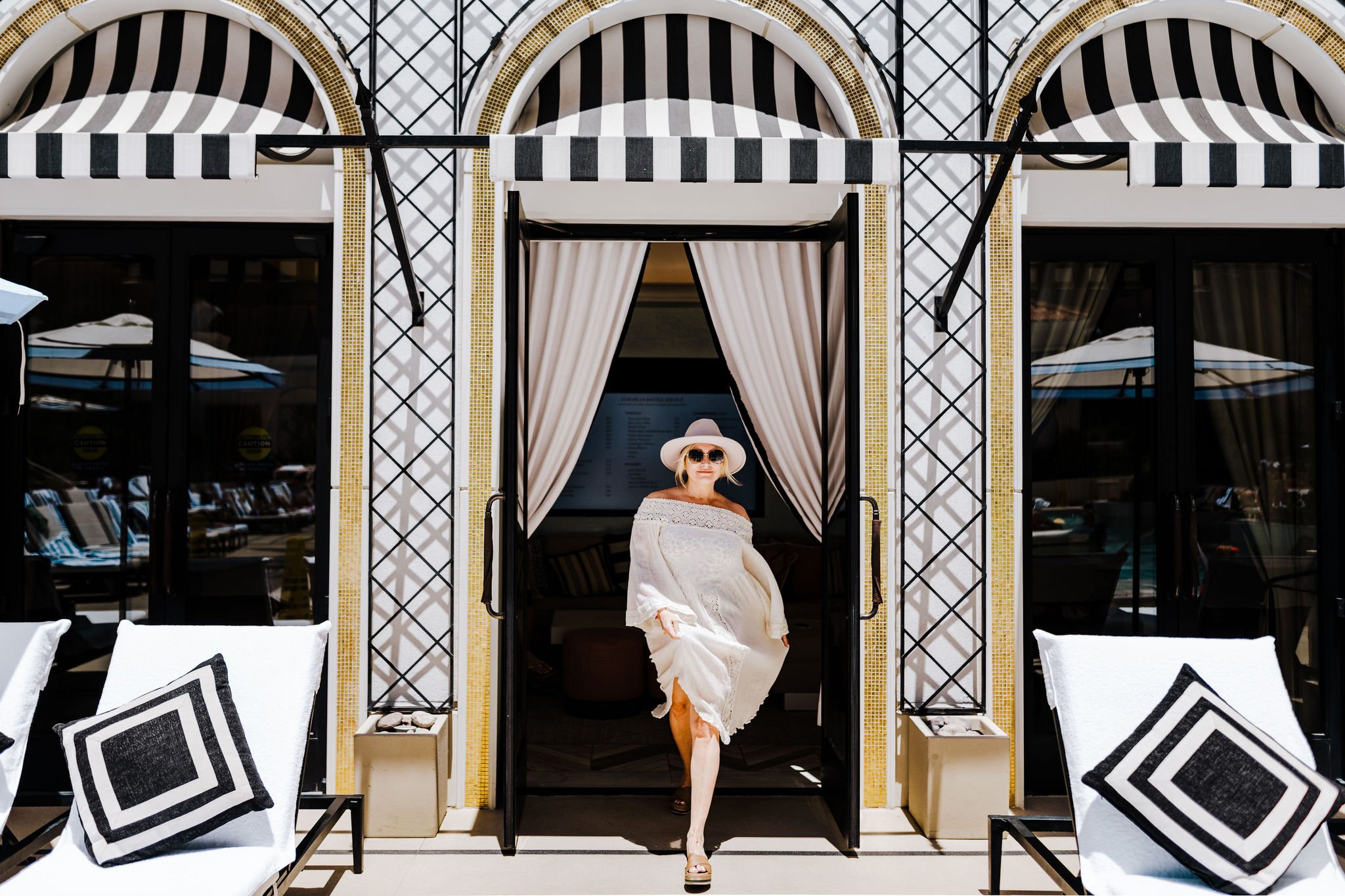 woman walking out of cabana