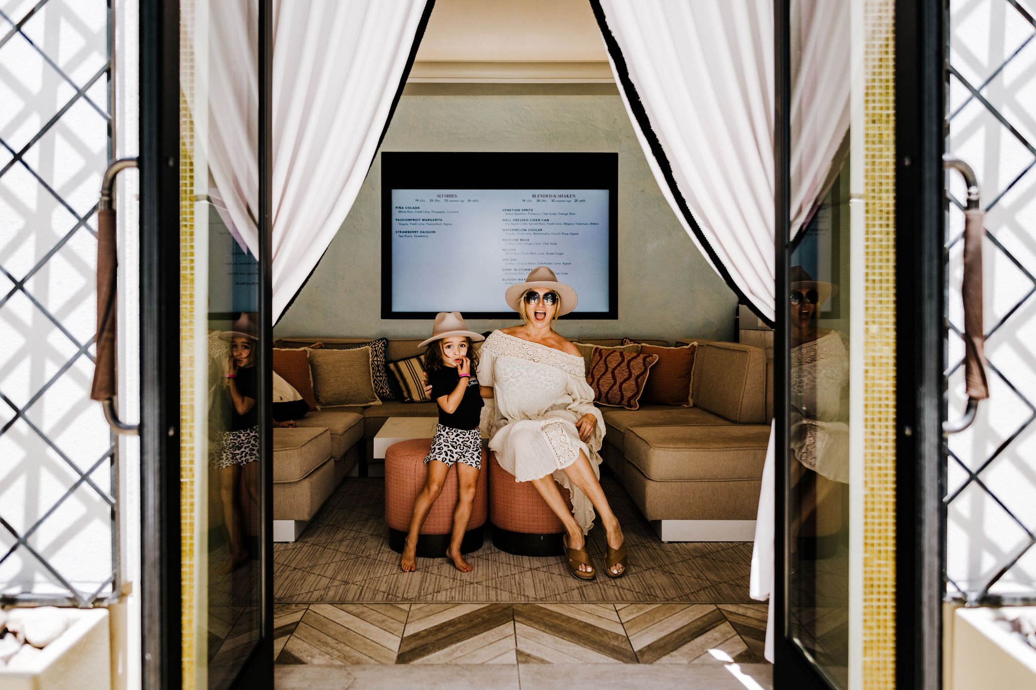 mom and child in pool cabana