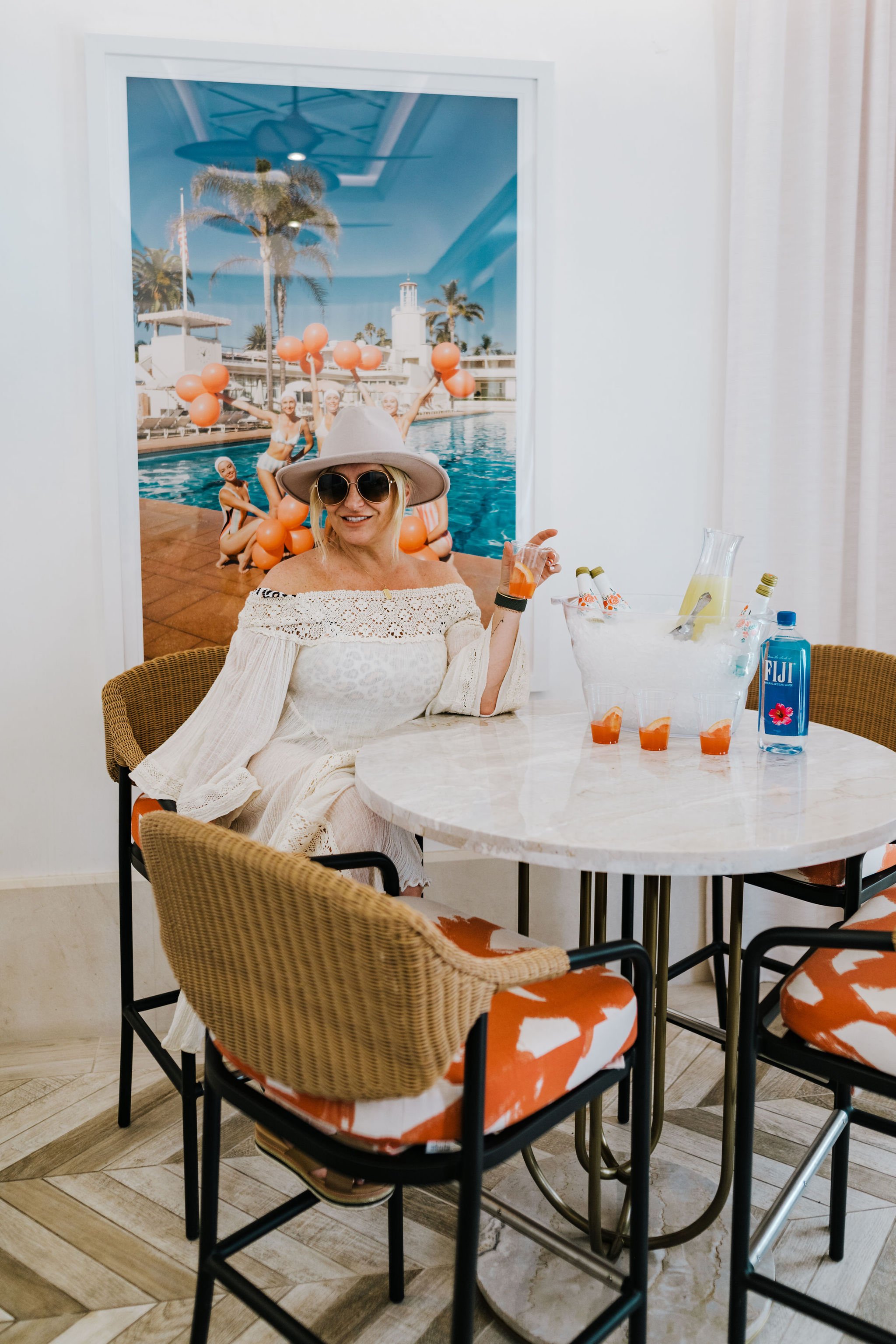 woman sitting with drink