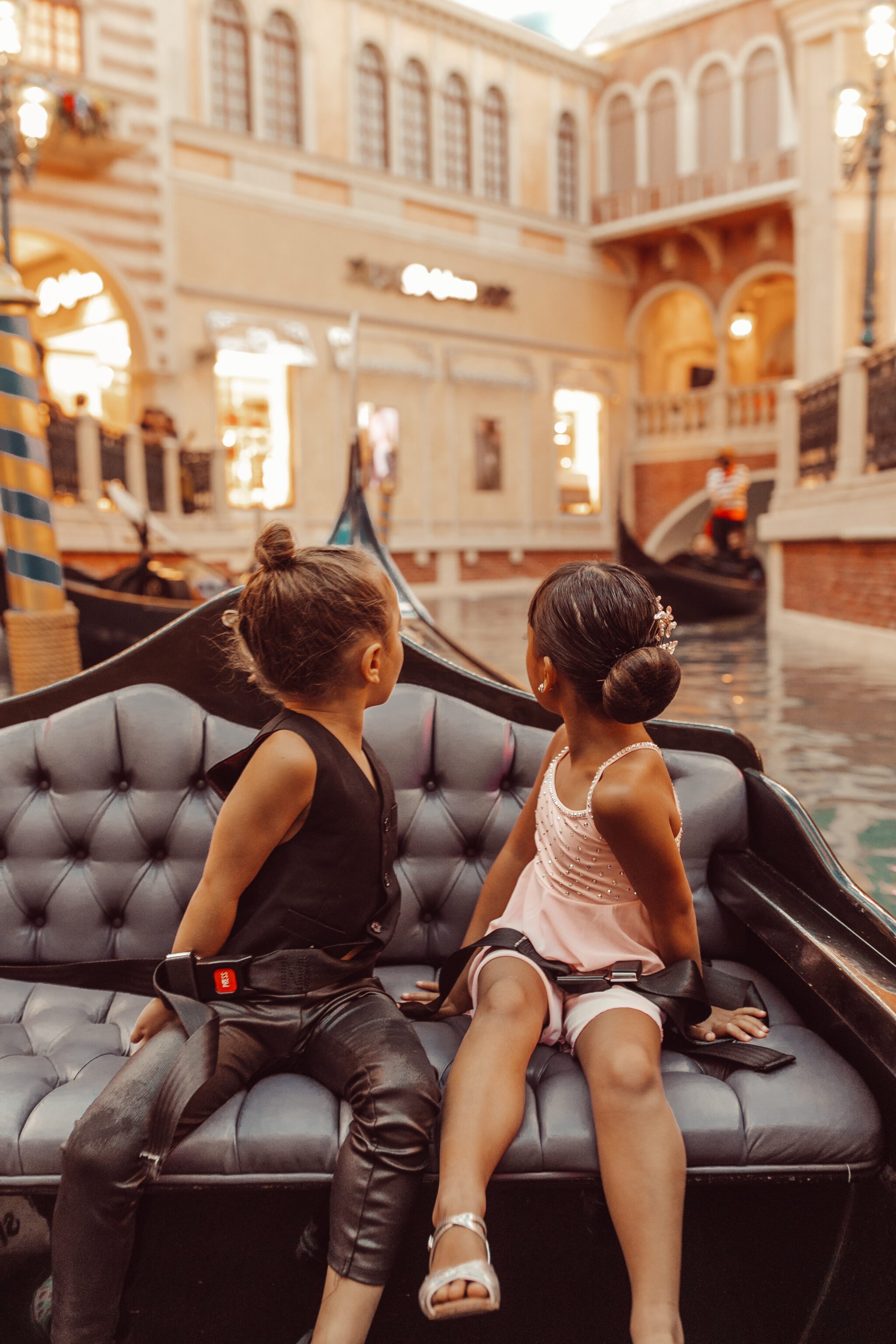 kids on venetian gondola 