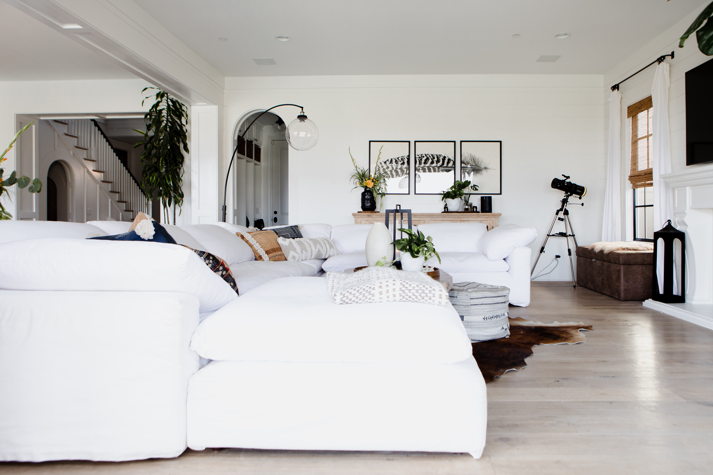 A white bright living room with no one in it.