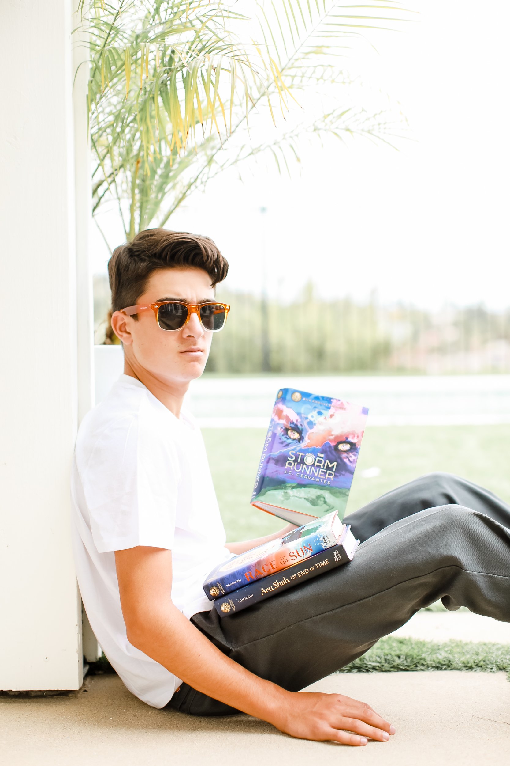 boy with a stack of books