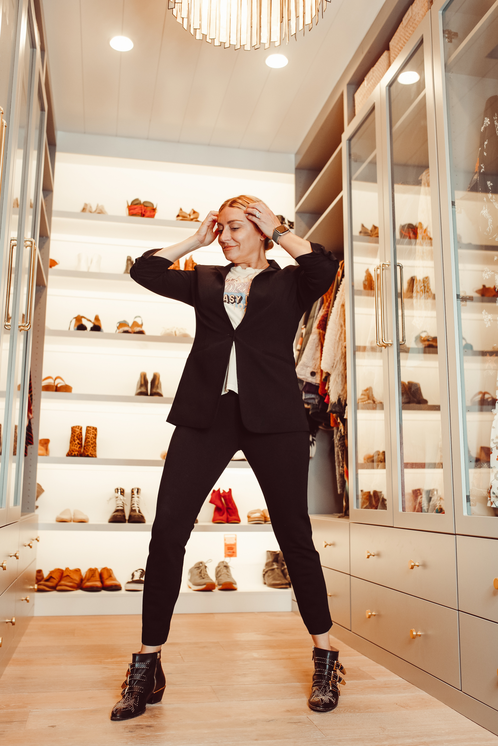 woman posing in closet