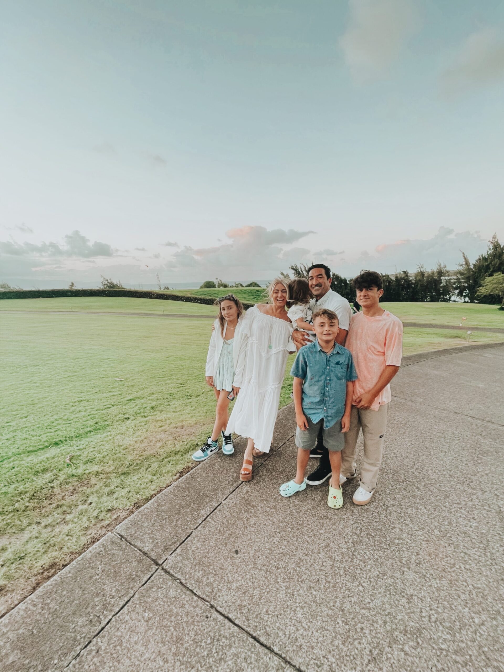 family on golf course