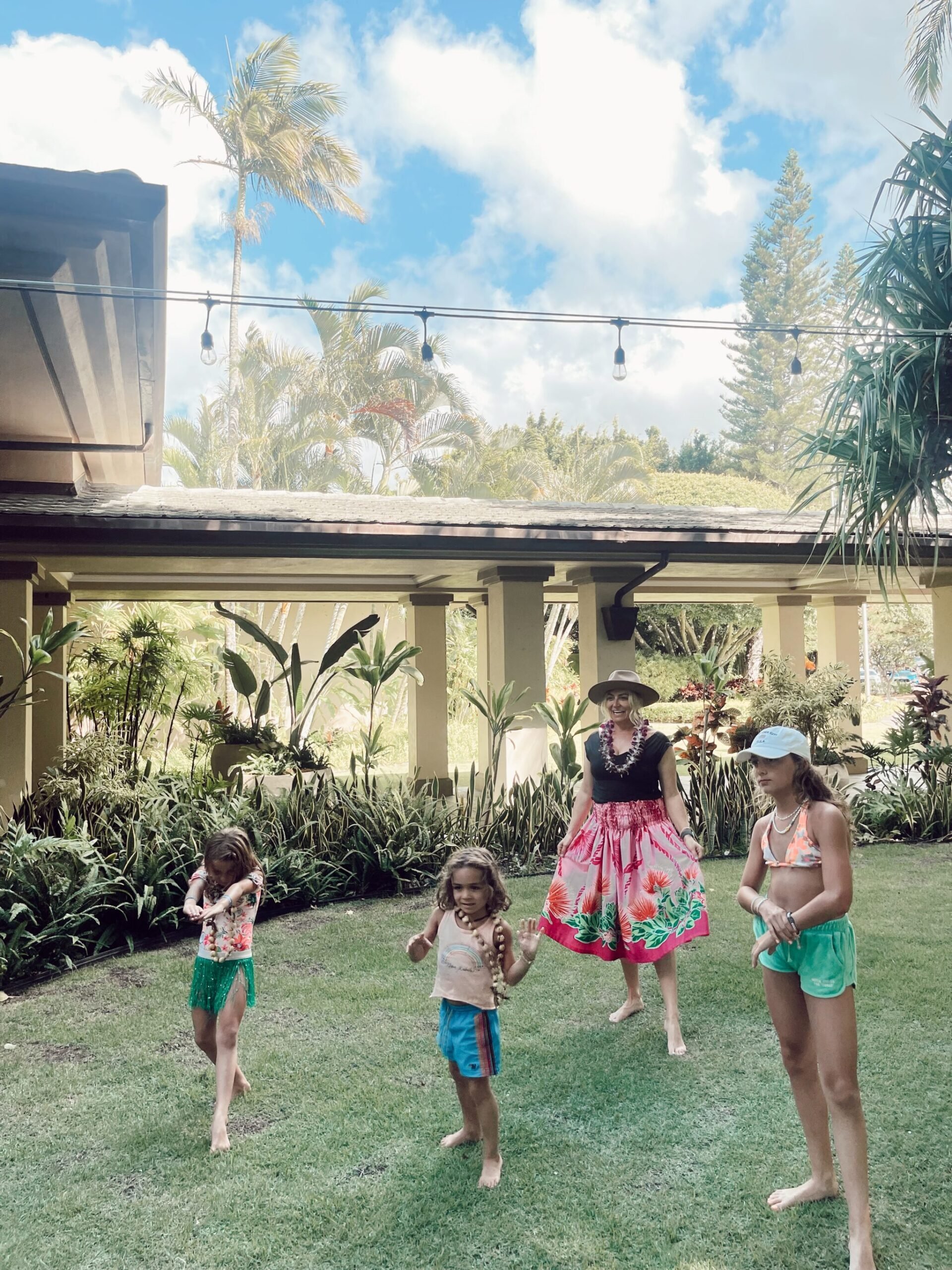 family playing outdoors in maui
