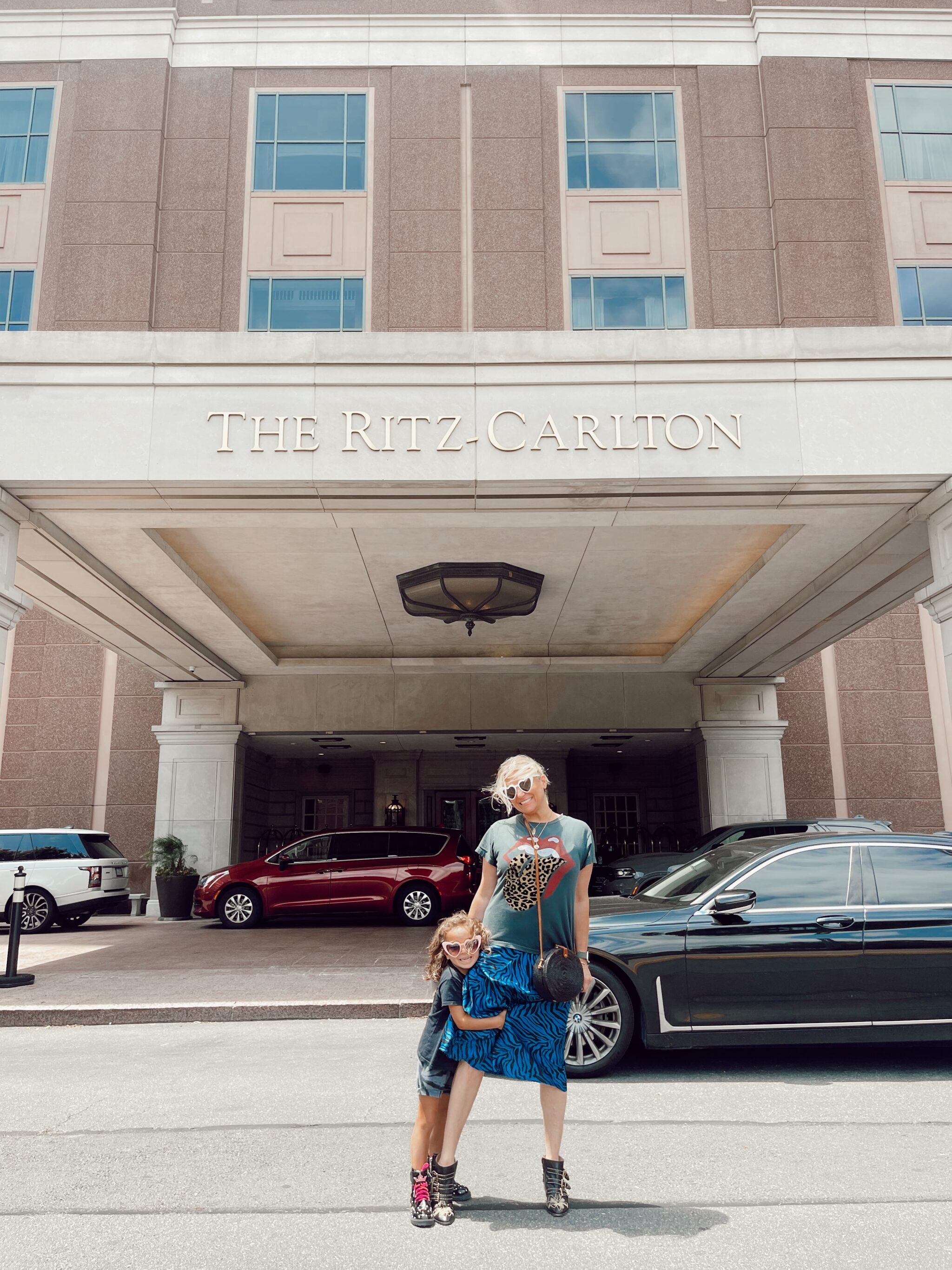 mom and son outside hotel