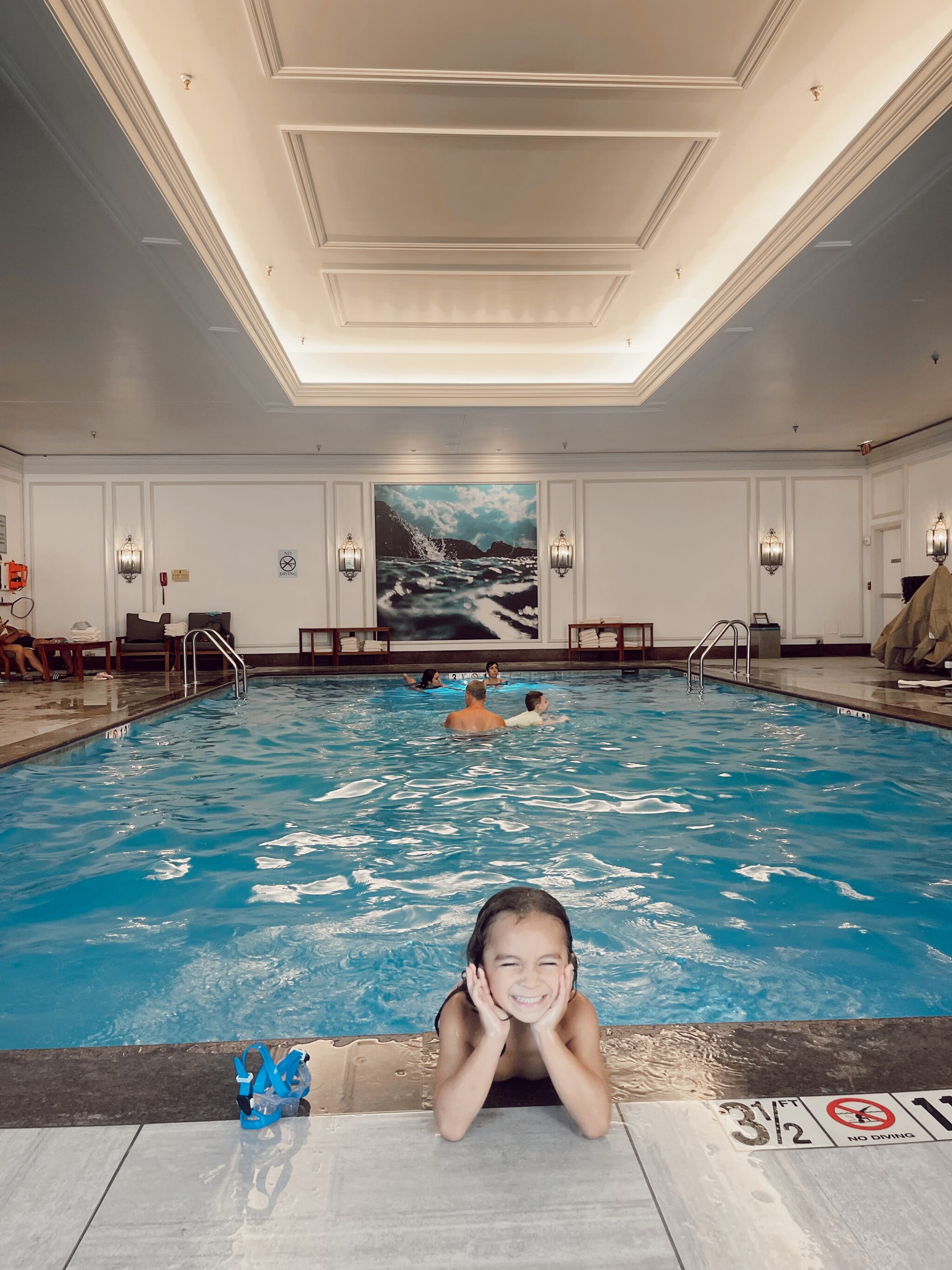 boy playing in pool