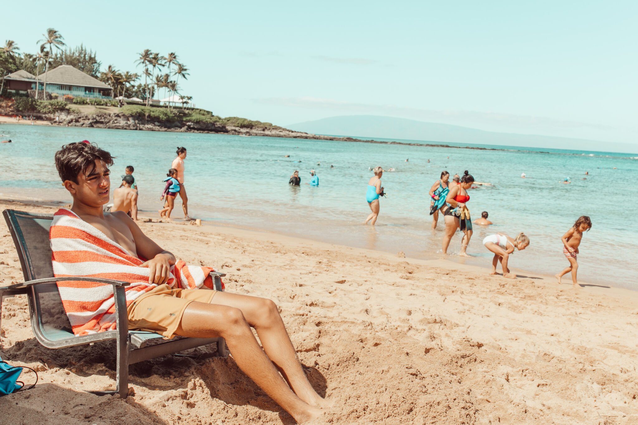 boy on beach in hawaii