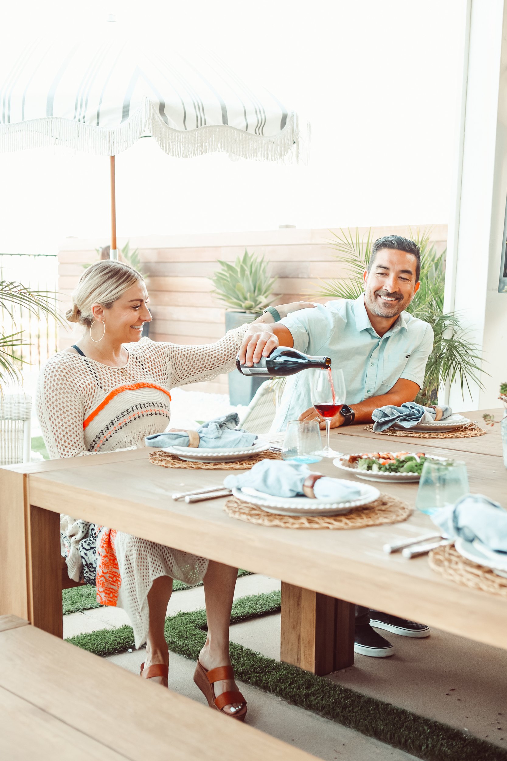 couple drinking wine outdoors