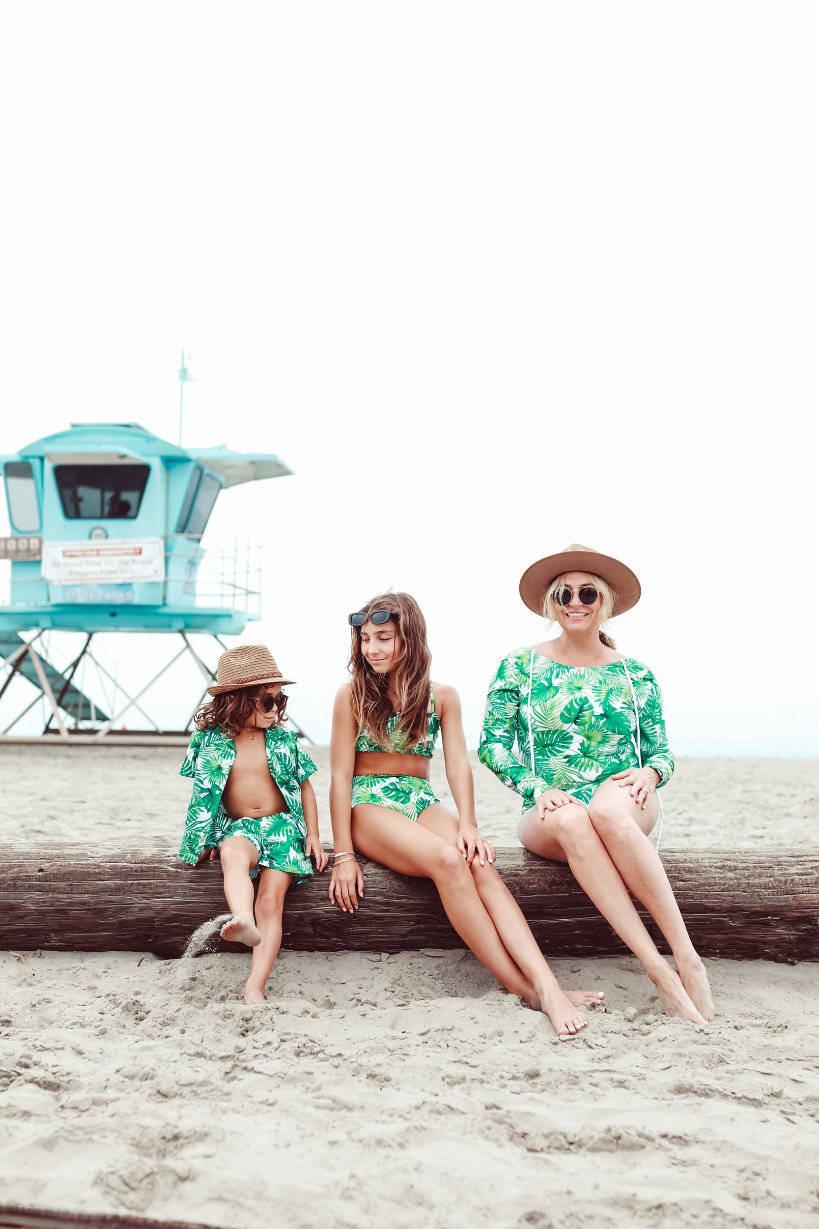 mom and kids in matching summer swimwear