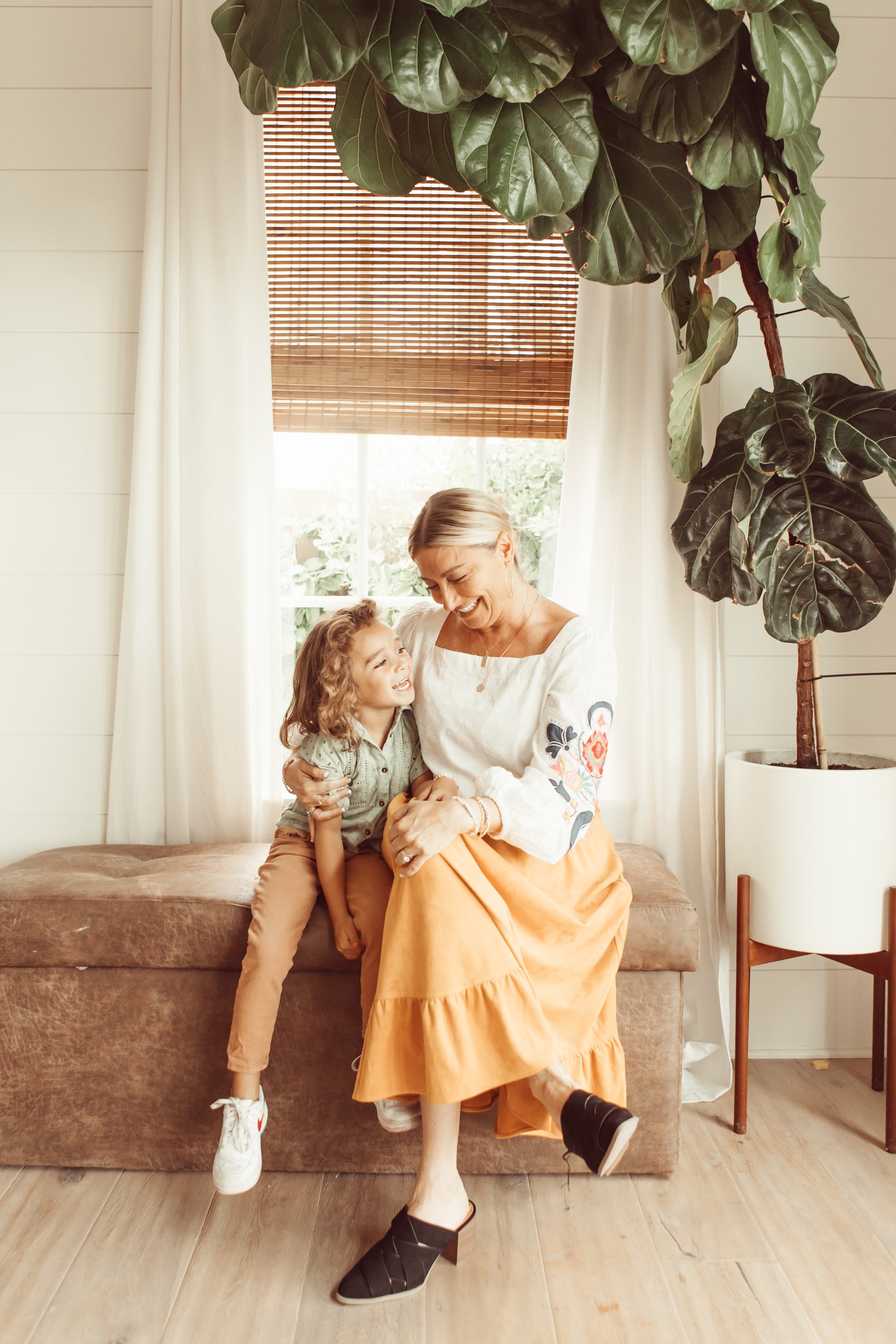 mom laughing with child