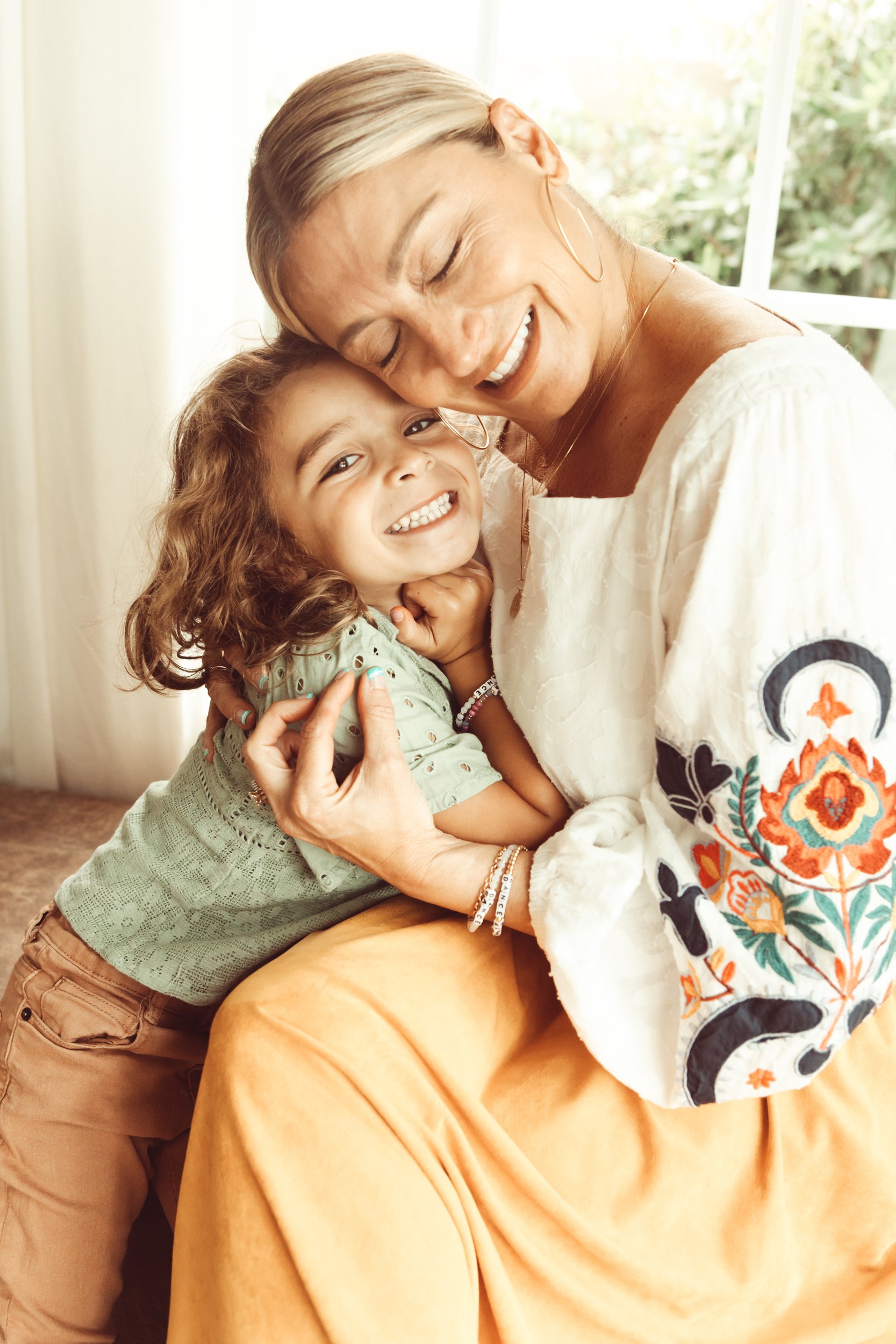 mom and son hugging