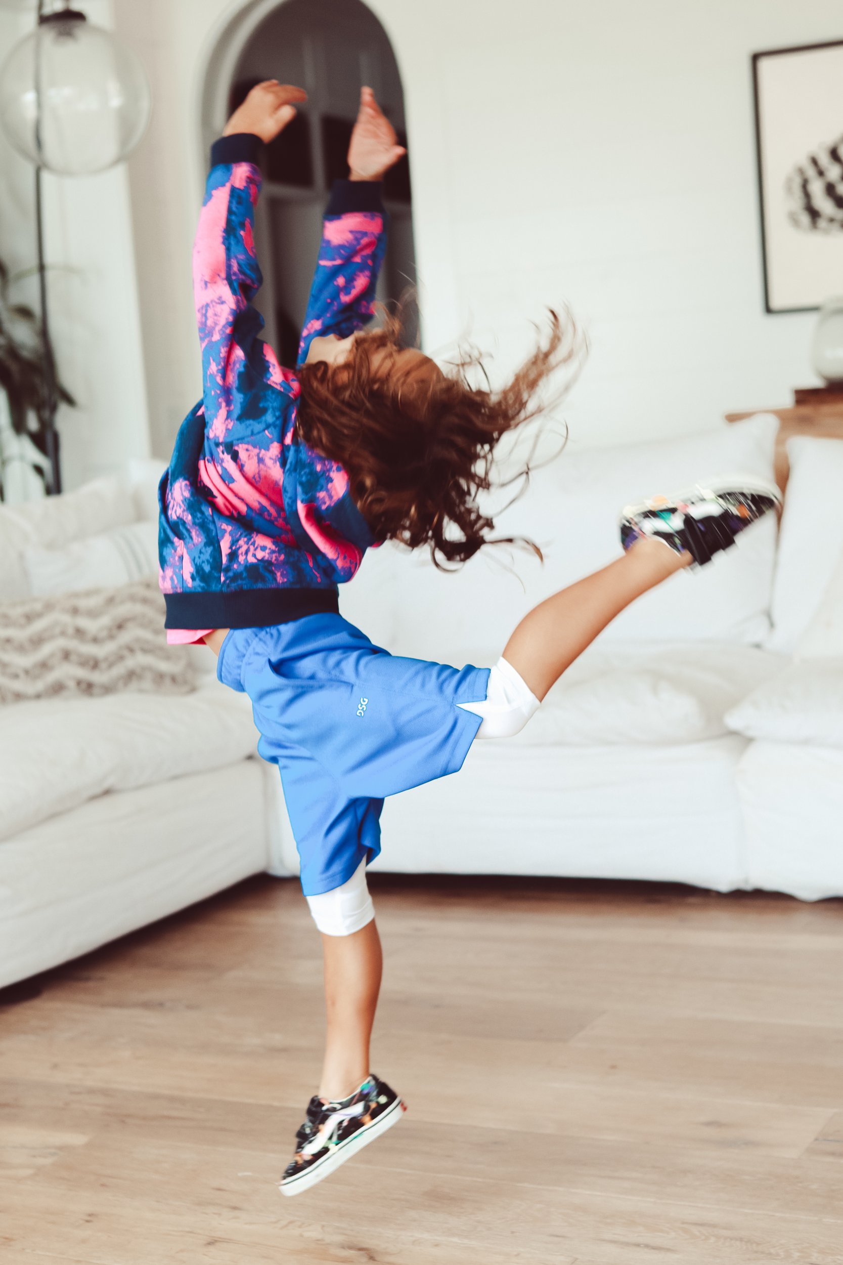 boy dancing in his living room